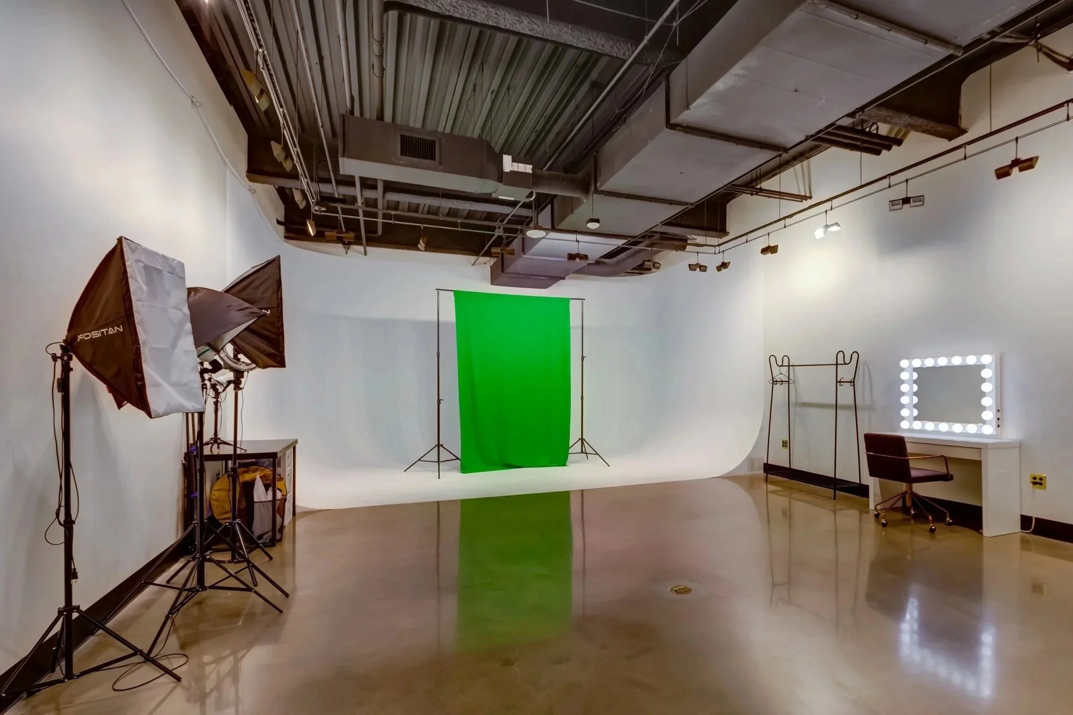 Commercial painting and office finishes by Van-Go Painting in a Denver coworking studio space