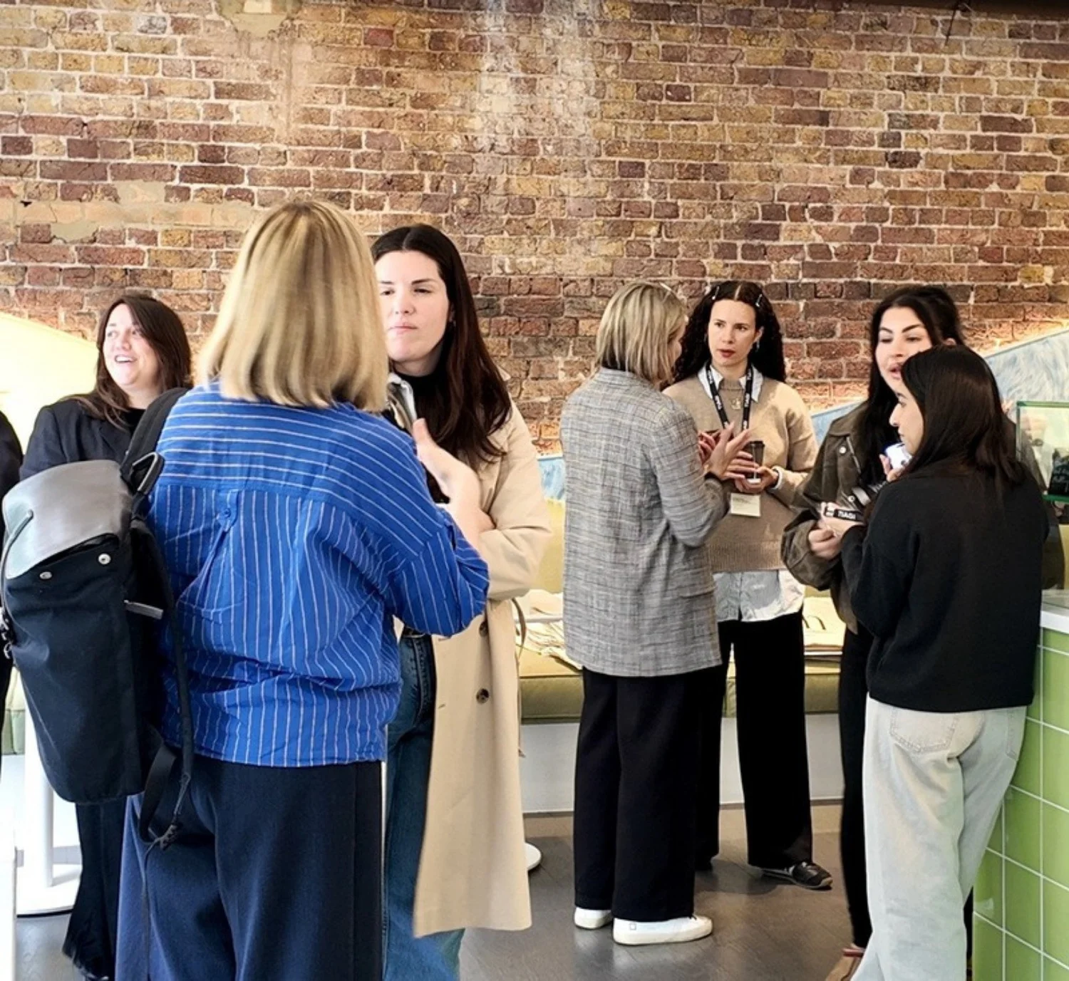 Guests talking in small groups