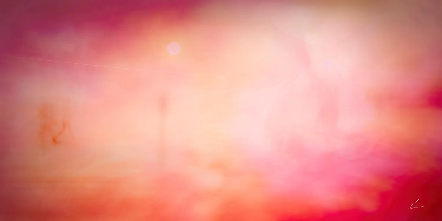 An abstract background with warm pink, orange, and red hues with soft blurry shapes.