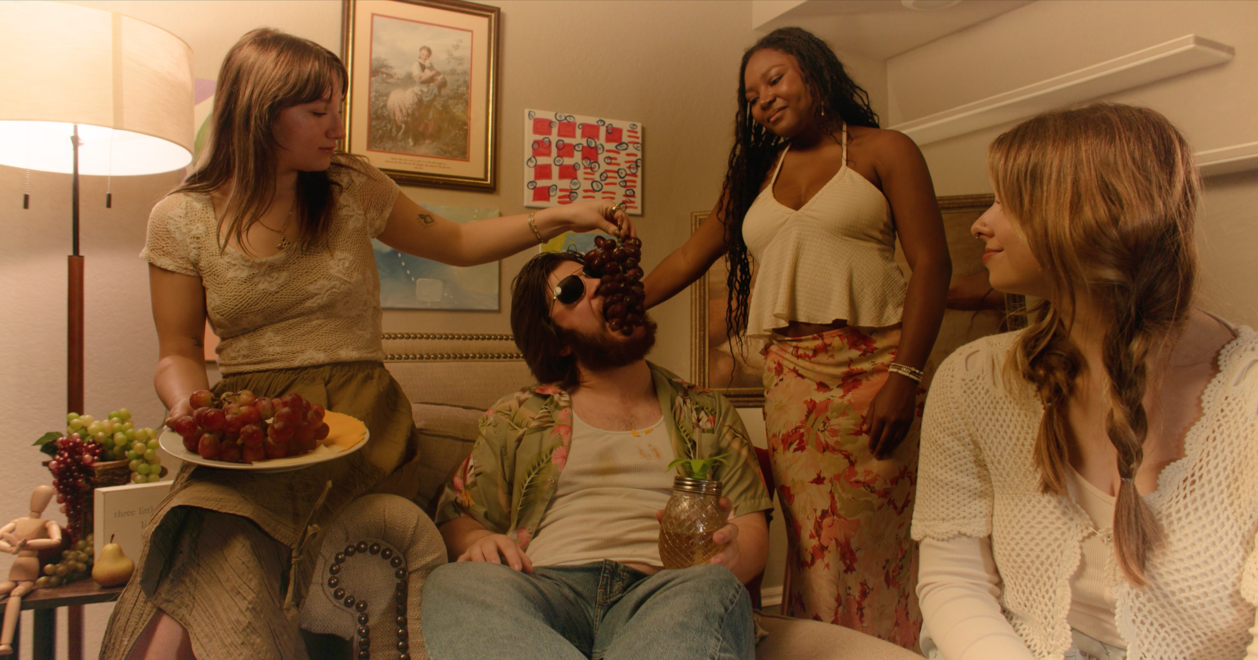 Still from the short film, SAM BROWNSTONE & THE PAINTETTES (2025), featuring Jake Ayers, Conner Cagle, Alivia Downs, and Autumn Manus.