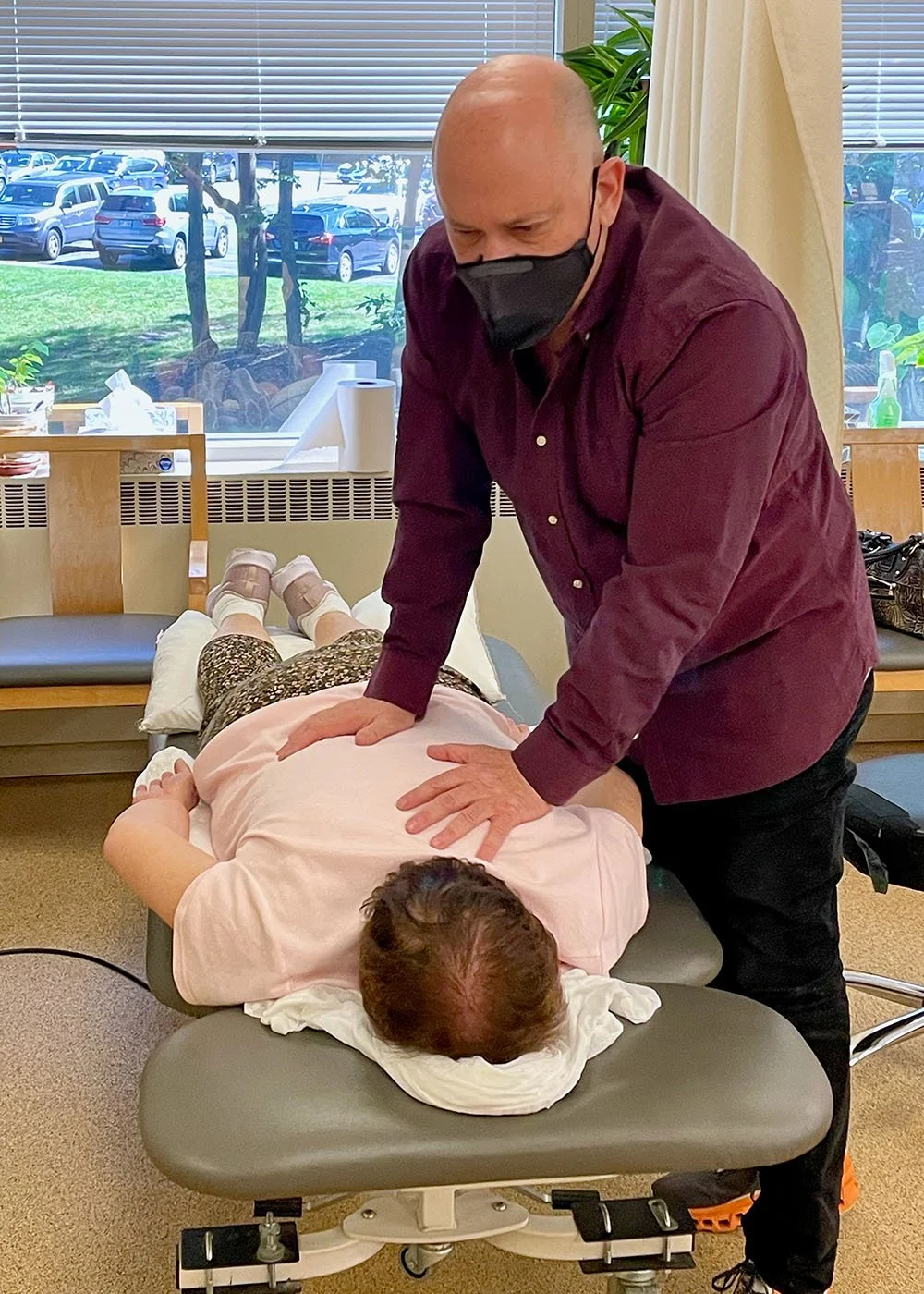Yossi providing physical therapy