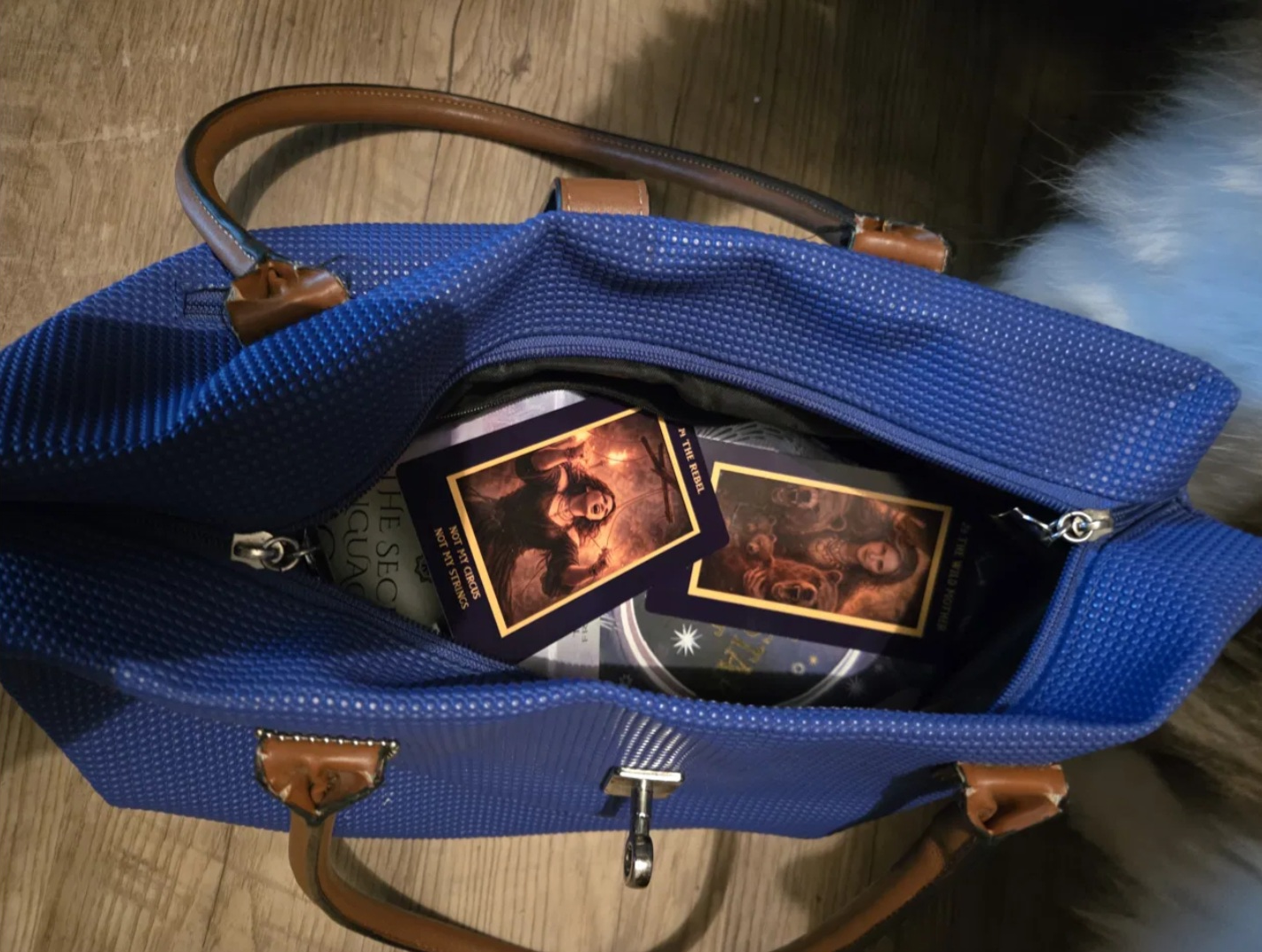 Oracle cards hidden in a purse – the origin story of the Dangerous Woman Oracle deck.