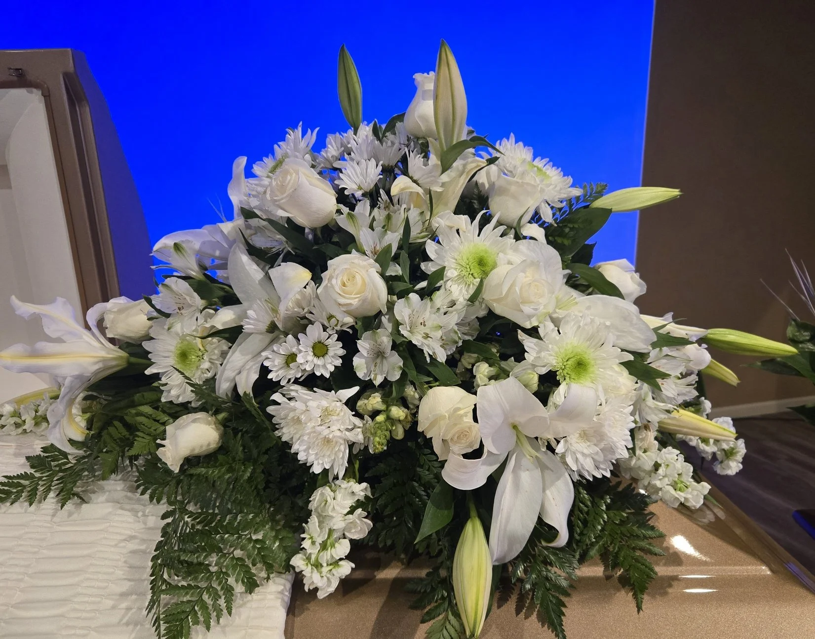 Elegance in Bloom: White Floral Casket Spray