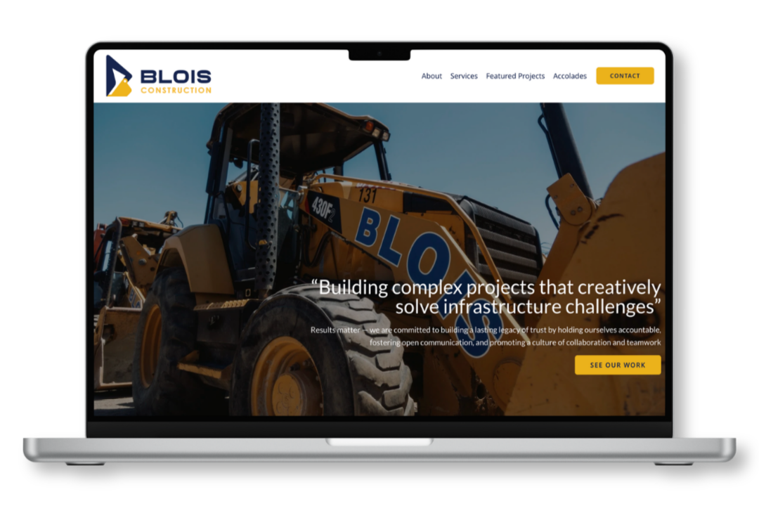 Computer mockup showing website design for Blois Construction infrastructure and construction company