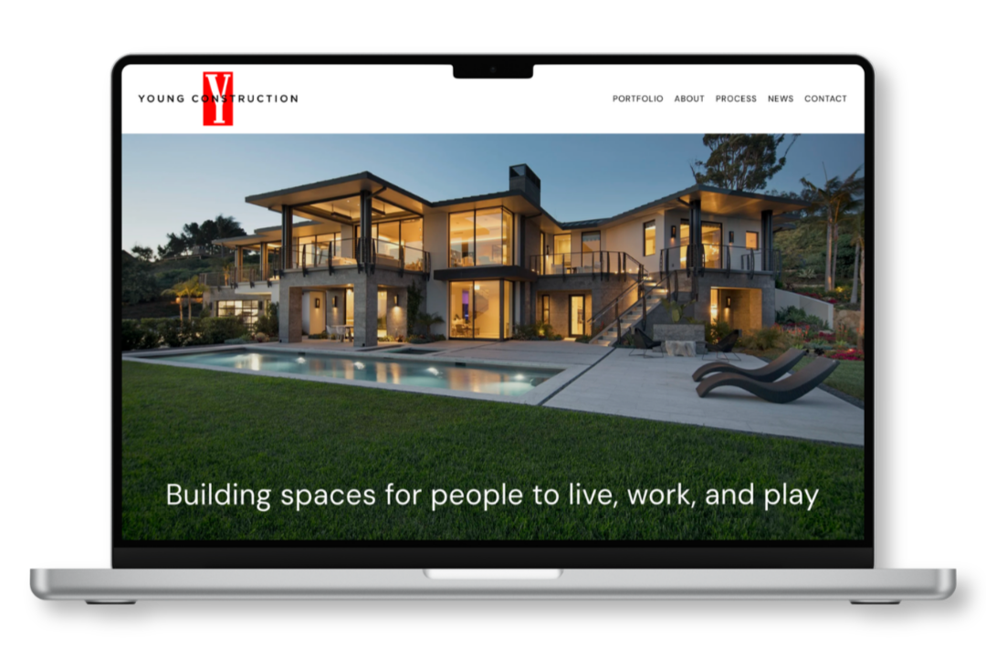 Computer mockup showing website design for Young Construction residential and commercial builder