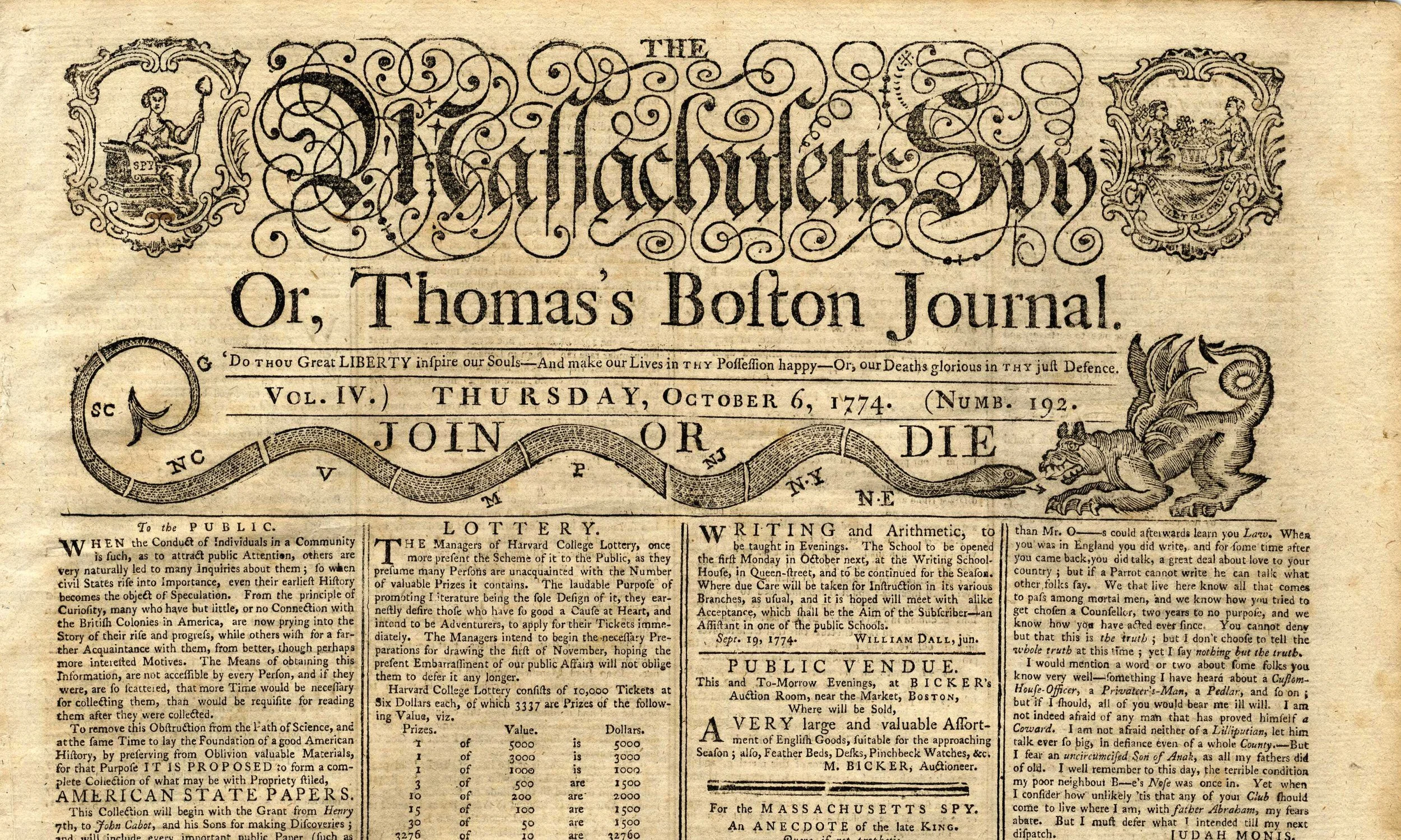 Historical newspaper page from 1774 titled 'The Massachusetts Spy, or, Thomas Bolton Journal,' featuring decorative illustrations, a snake, a lion, and detailed text about the publication.