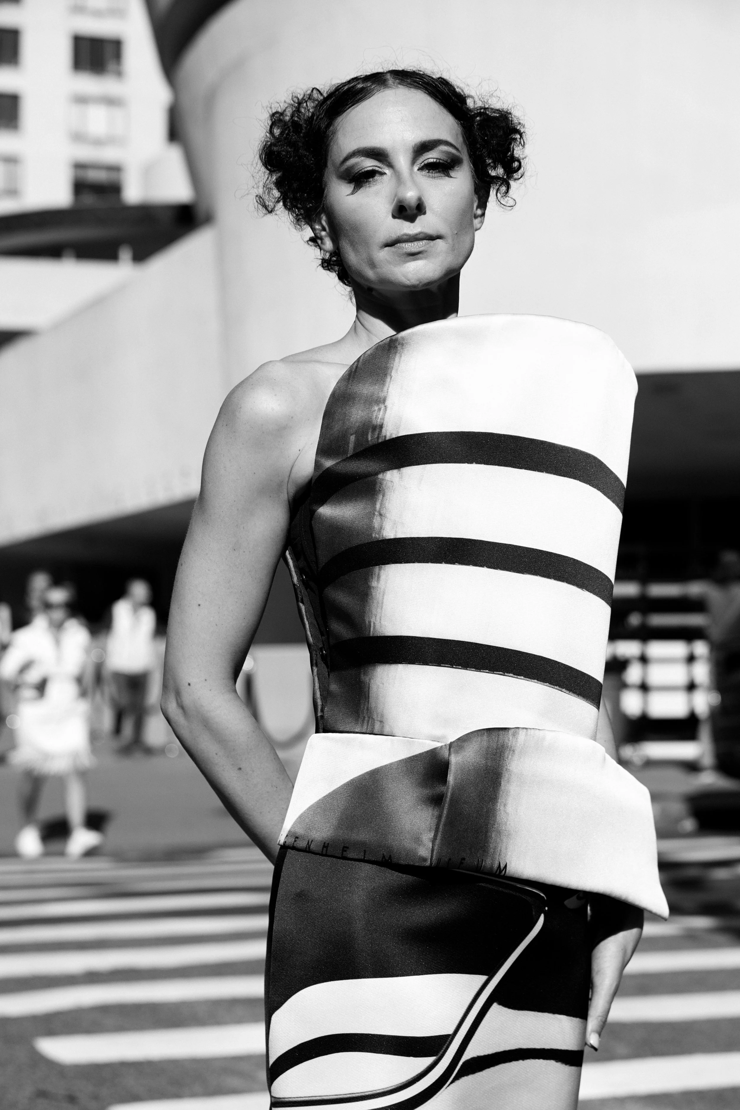 Nicky Conti wearing an architectural couture piece with layered structure inspired by the Guggenheim Museum in New York City