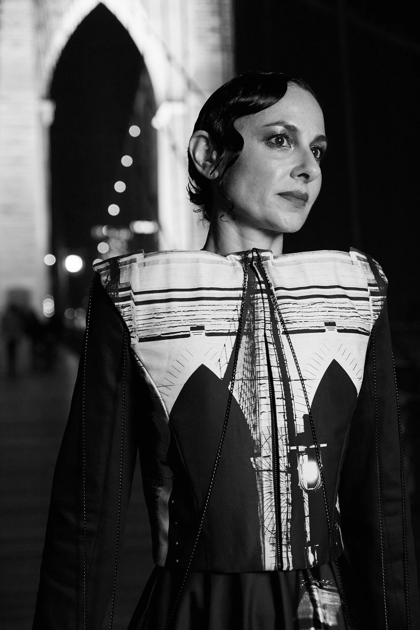 Nicky Conti wearing a custom couture look inspired by a photo she took of the Brooklyn Bridge at night in New York City