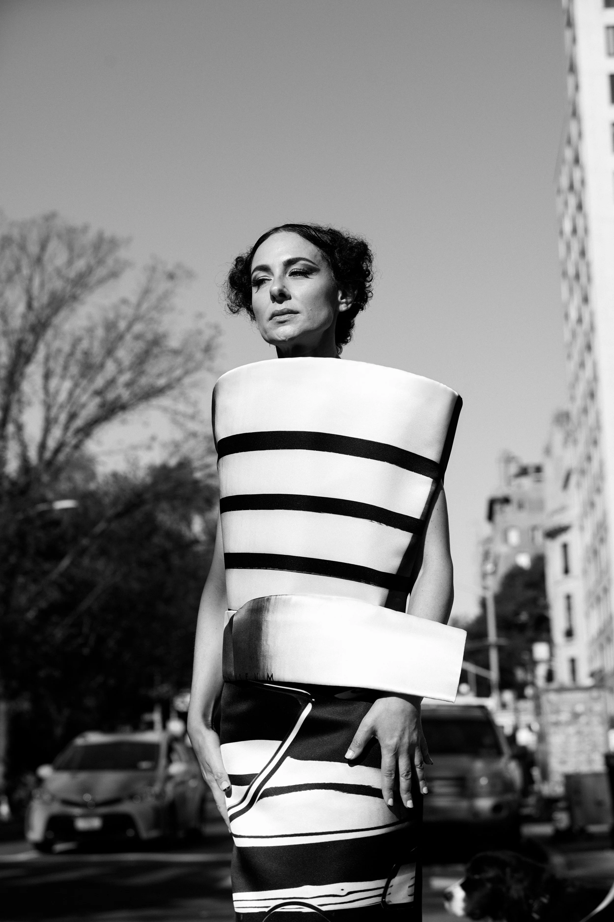 Nicky Conti wearing a sculptural couture look with curved, spiral form inspired by the Guggenheim, photographed in New York City