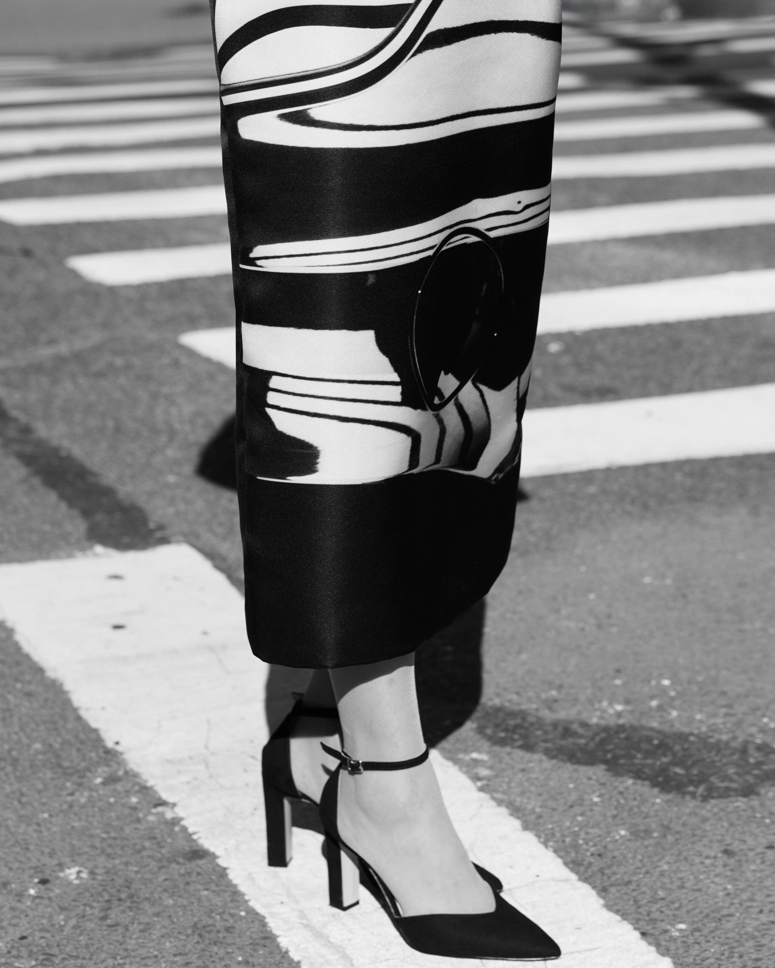 Nicky Conti wearing the Ziggura couture look, with a skirt printed from a photograph of the Guggenheim’s reflection, photographed in New York City