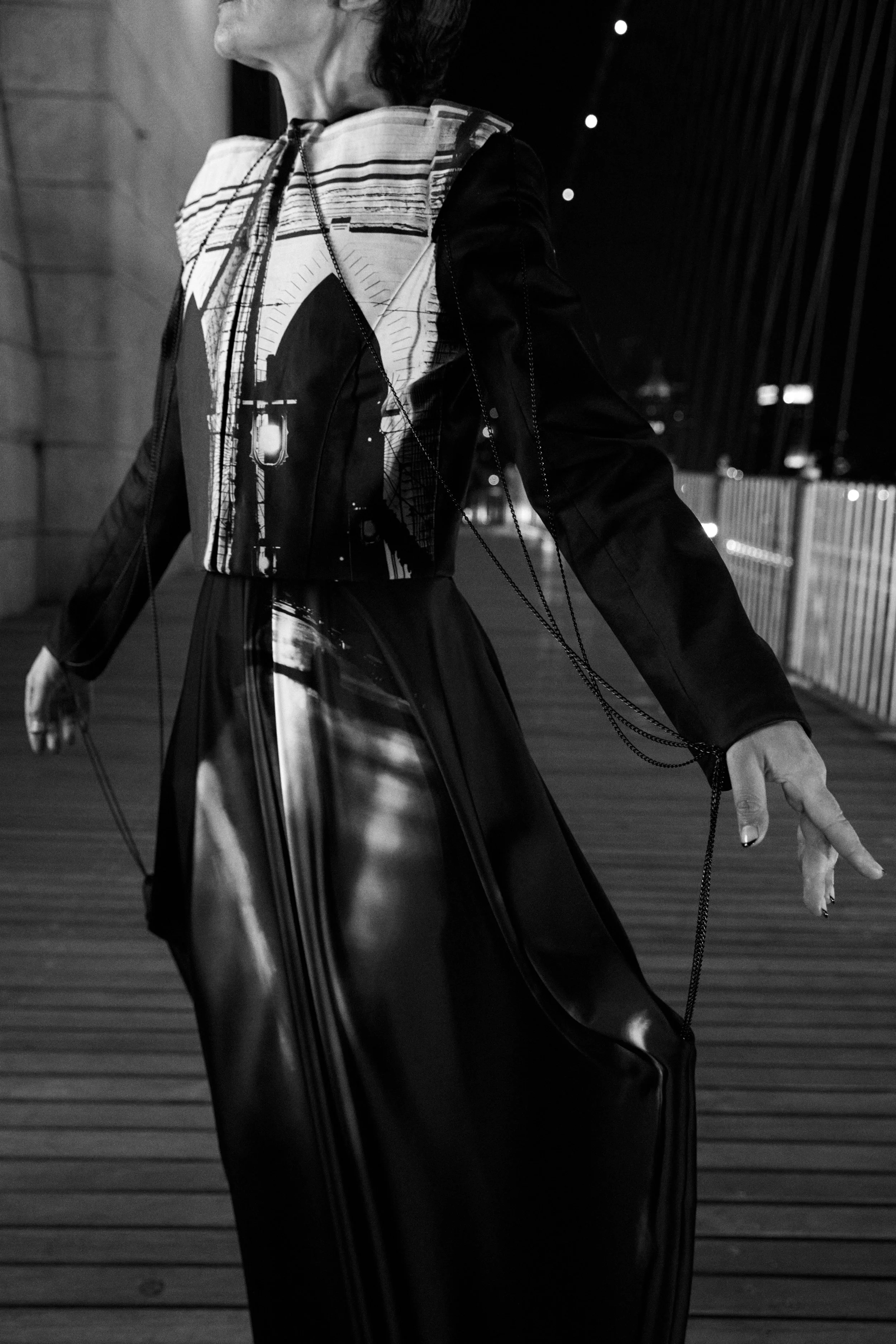 Close-up of wearable architecture with chain details inspired by the Brooklyn Bridge cables
