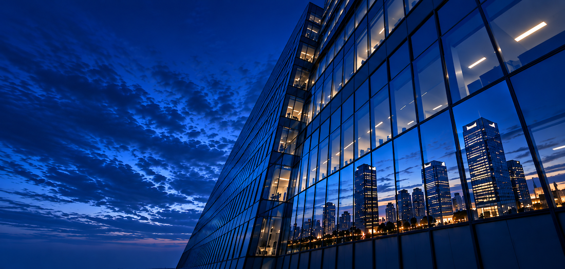 inspiring skyscraper view looking up into night sky with deep navy blue background