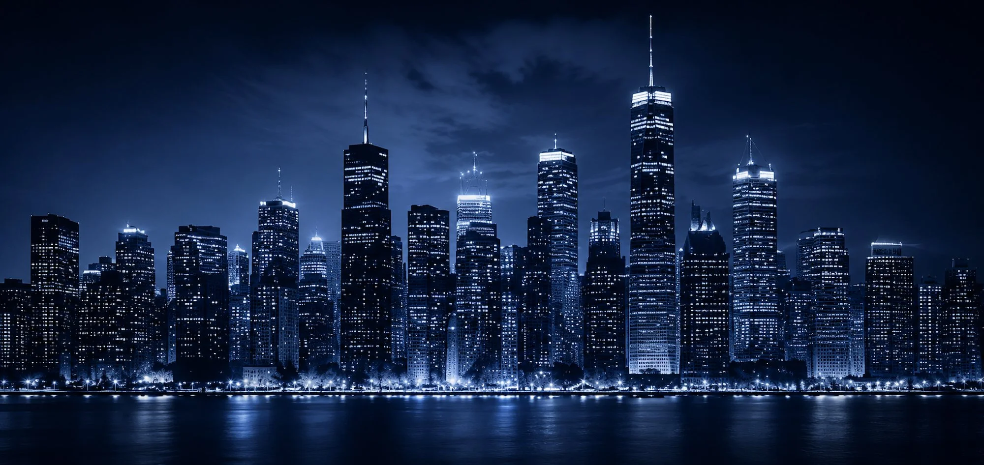 Blue city skyline at night representing Driscoll Media Group’s business growth perspective and company story
