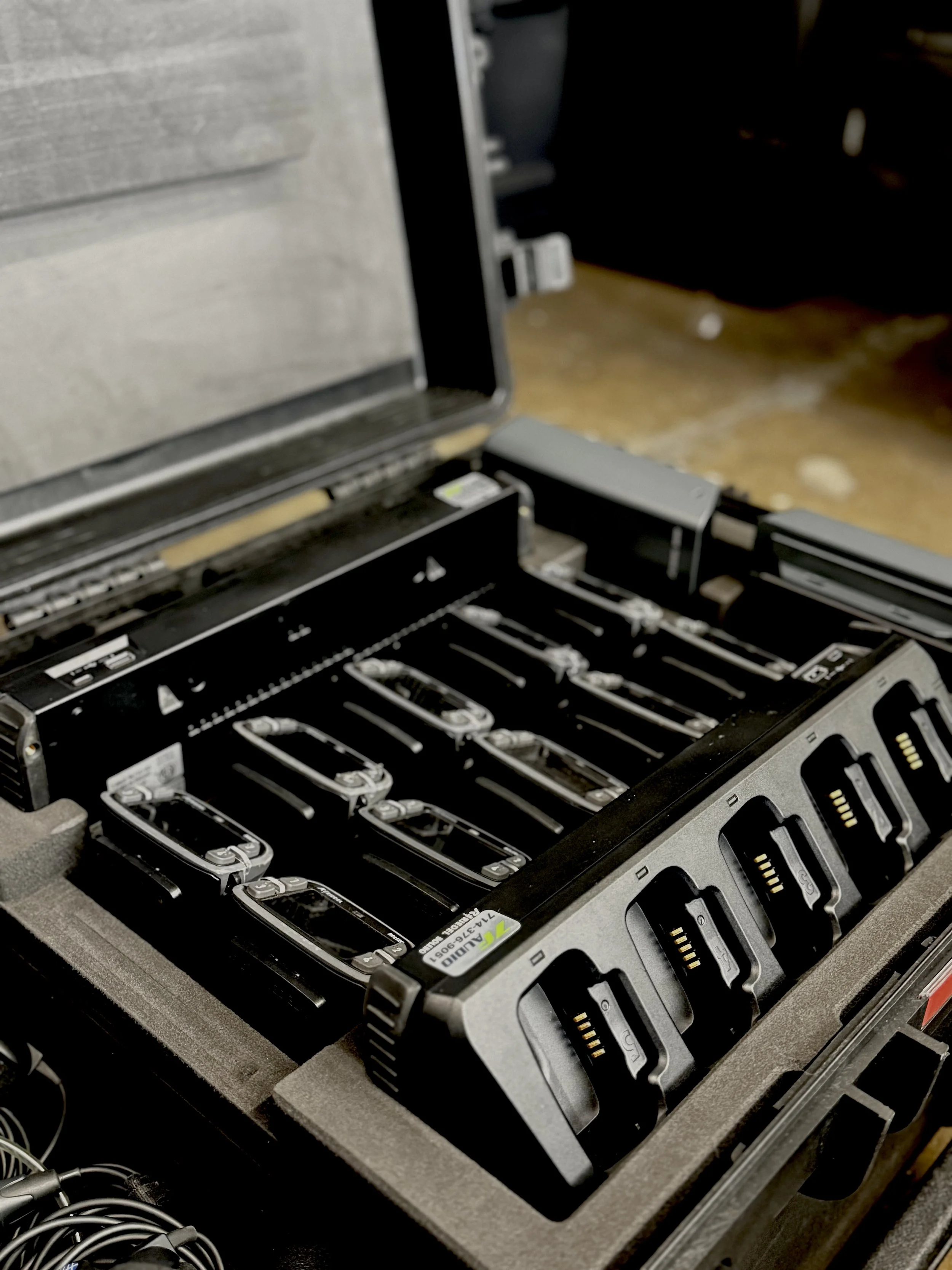 Open electronic storage device with multiple hard drives inside a case.