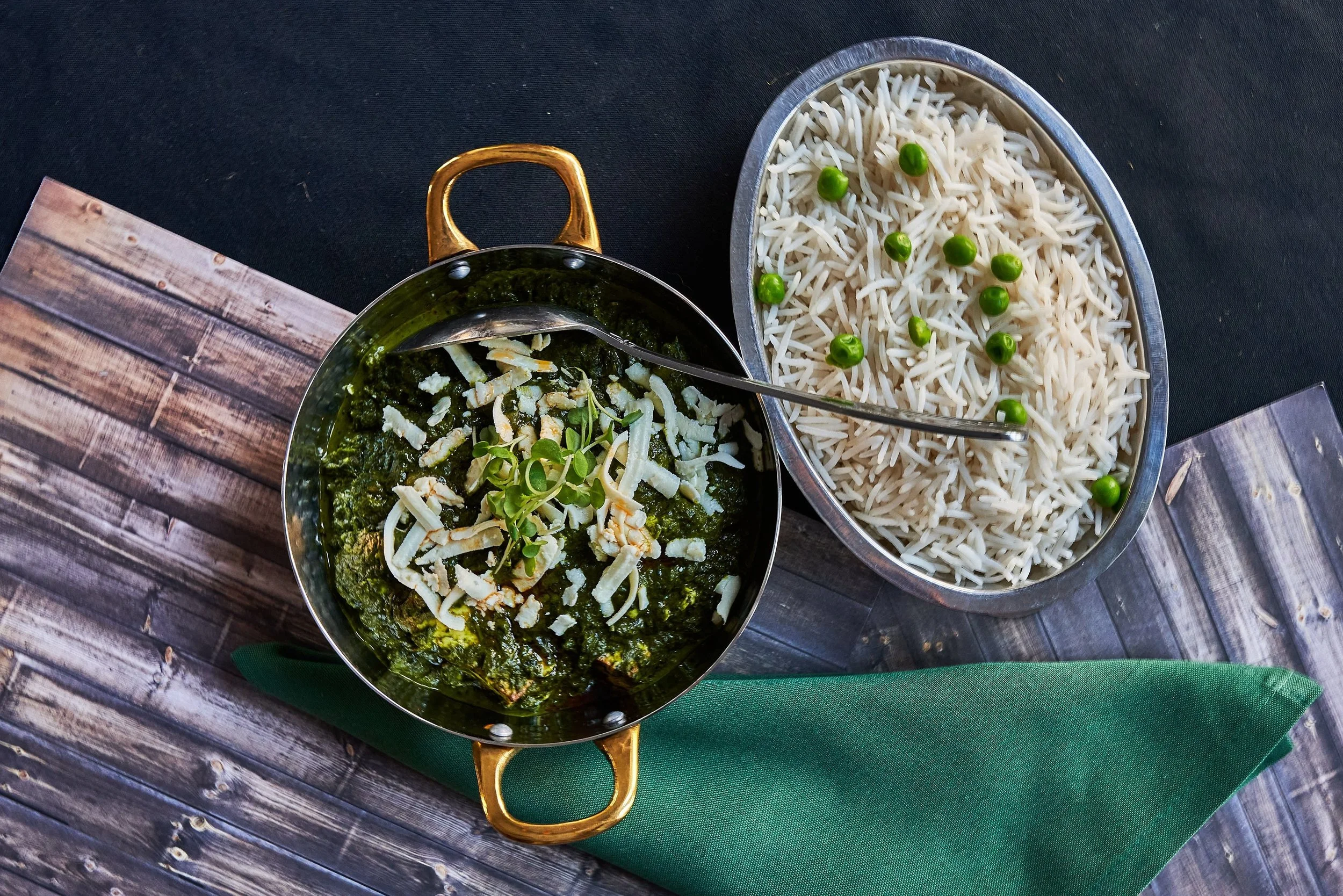 Palak paneer with a side of steamed basmati rice