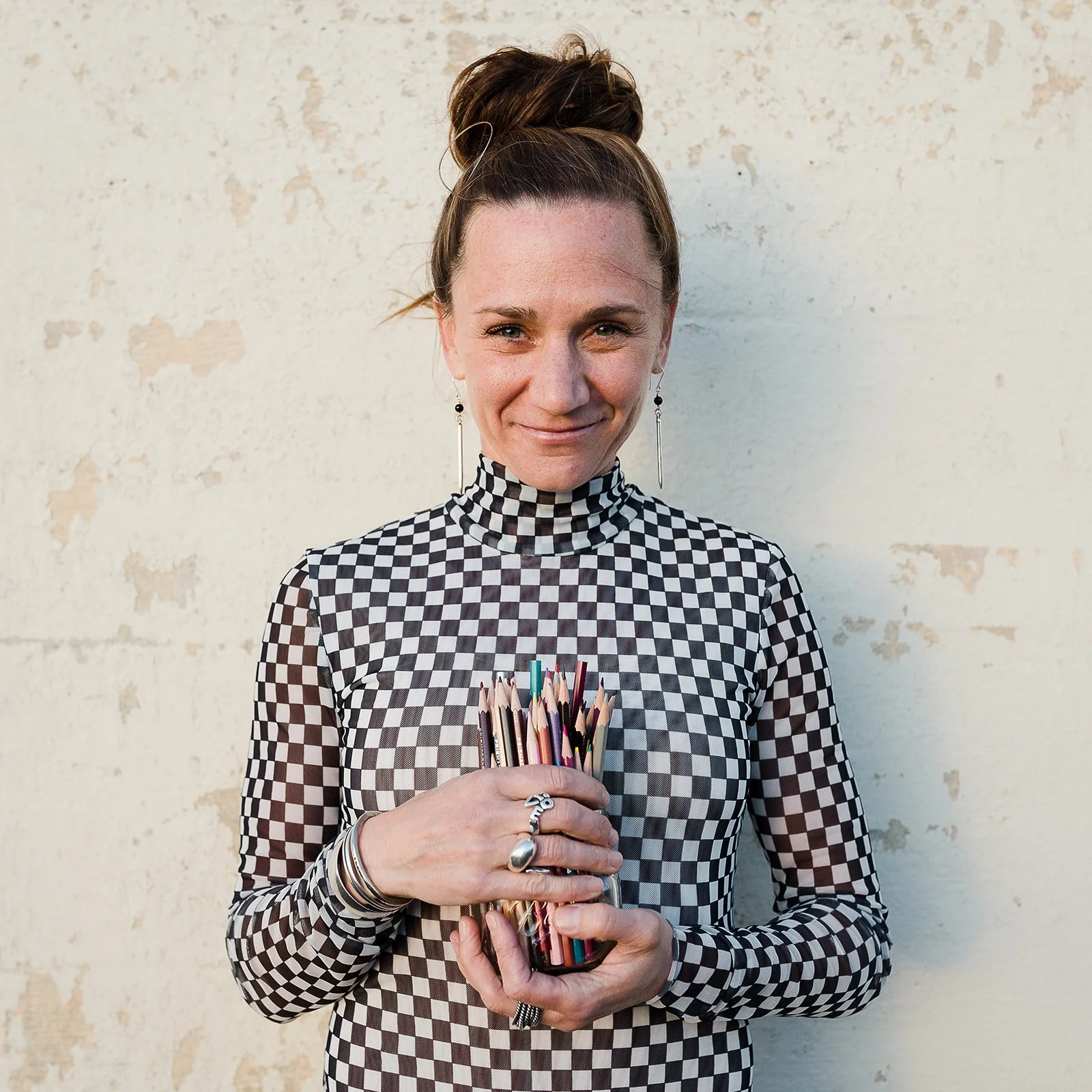 Woman with using creativity as a superpower through coaching, emotional regulation, IFS and is a NBC-HWC