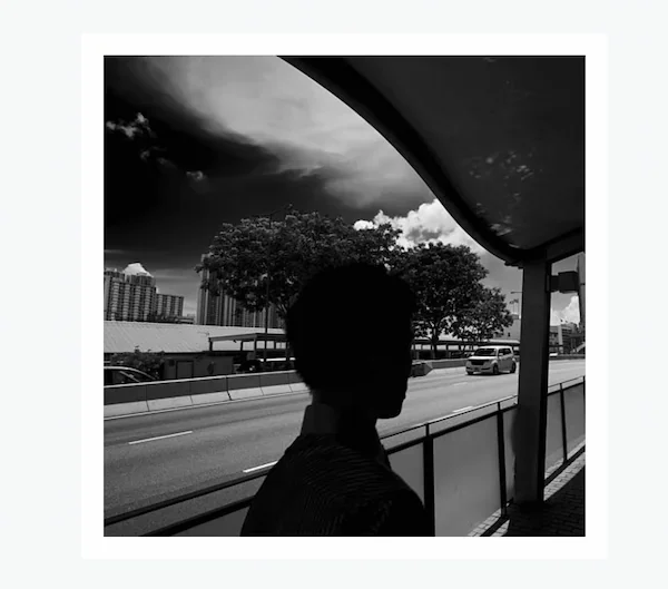 black-and-white-photo-of-a-man-silhouette-against-a-road-56kb.webp