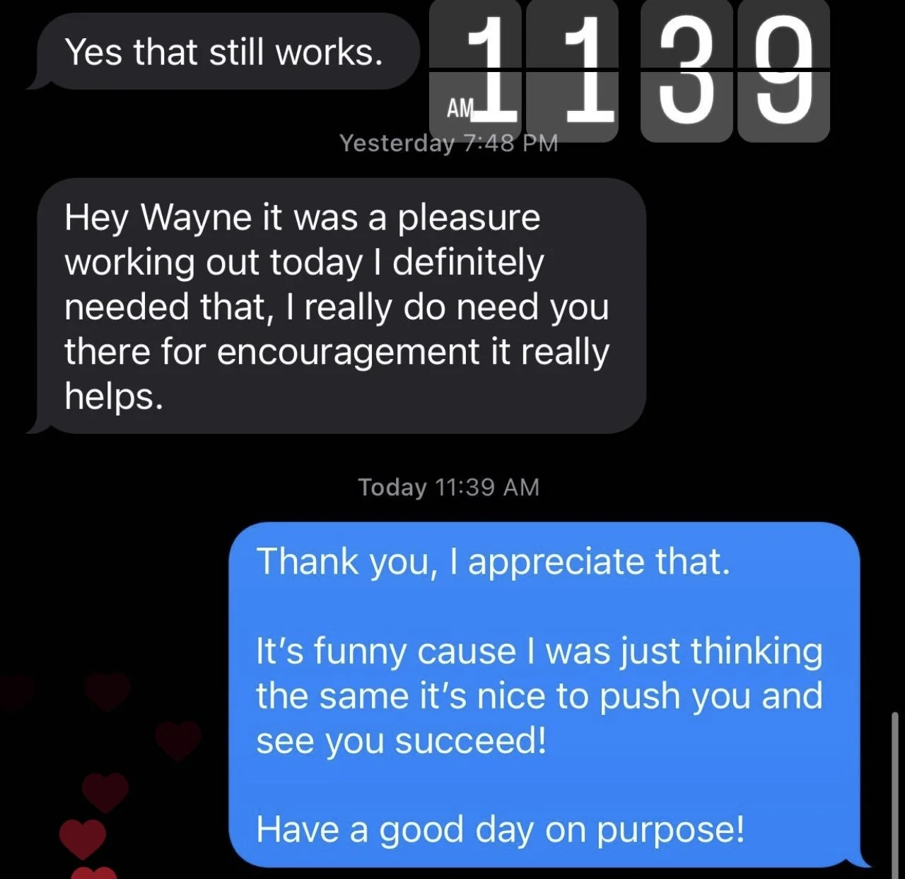 A screenshot of a text message conversation with black background, showing timestamps and white, blue, and gray chat bubbles, and red heart icons on the left side.
