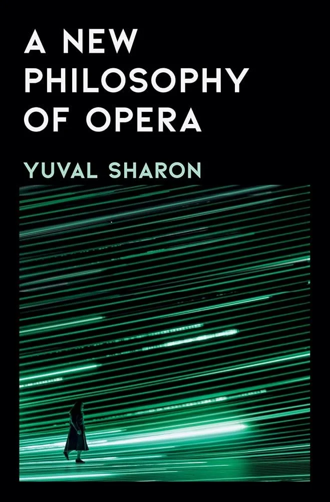 Book cover titled 'A New Philosophy of Opera' by Yuval Sharon, featuring a person standing against a backdrop of green light streaks in motion.