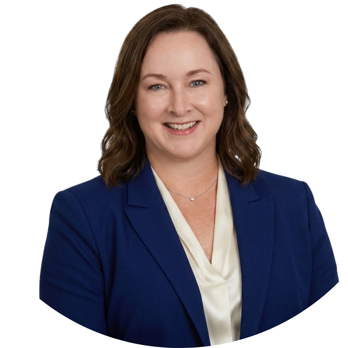 Professional headshot of a woman with shoulder-length brown hair, wearing a navy blue blazer and a cream-colored blouse, smiling.