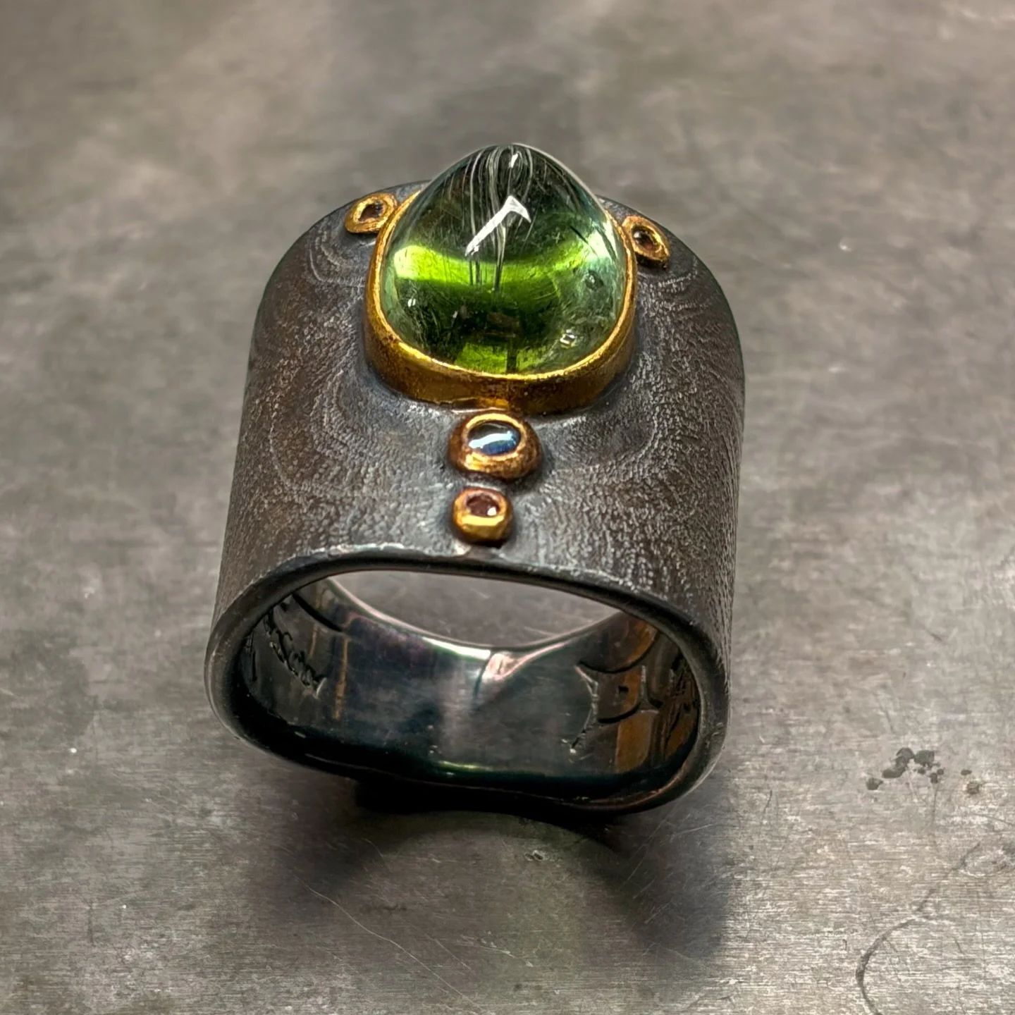 Tourmaline, sapphire, spinel. 22K and silver with patina &amp; engraving.

#oneoff