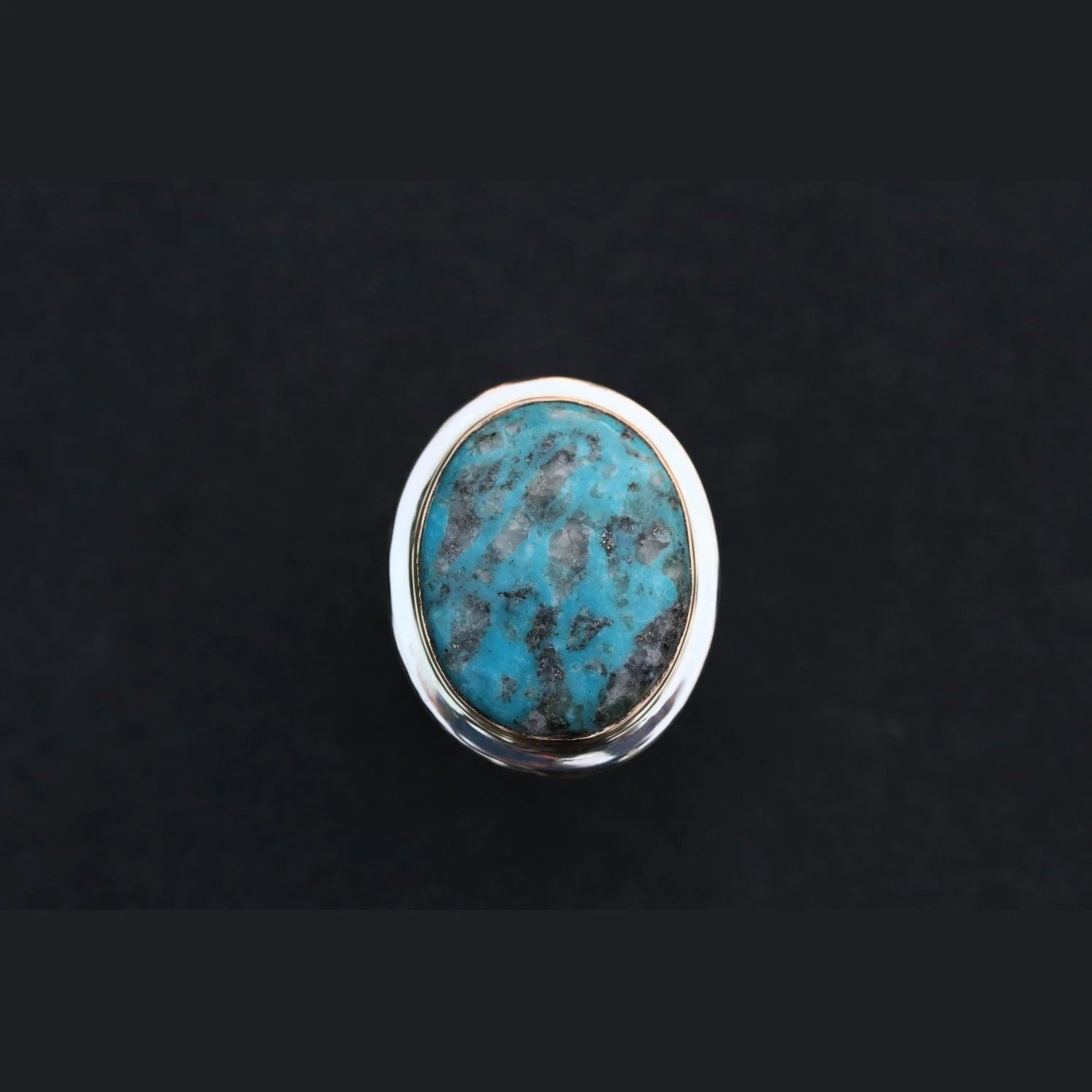 The Big Sur Ring.

My father began making them in the 1970s, before I was born. Other jewelers thought he was crazy. It looks simple. It is anything but simple to make well.

It honors tradition, the golden mean, and the pursuit of perfection in simp