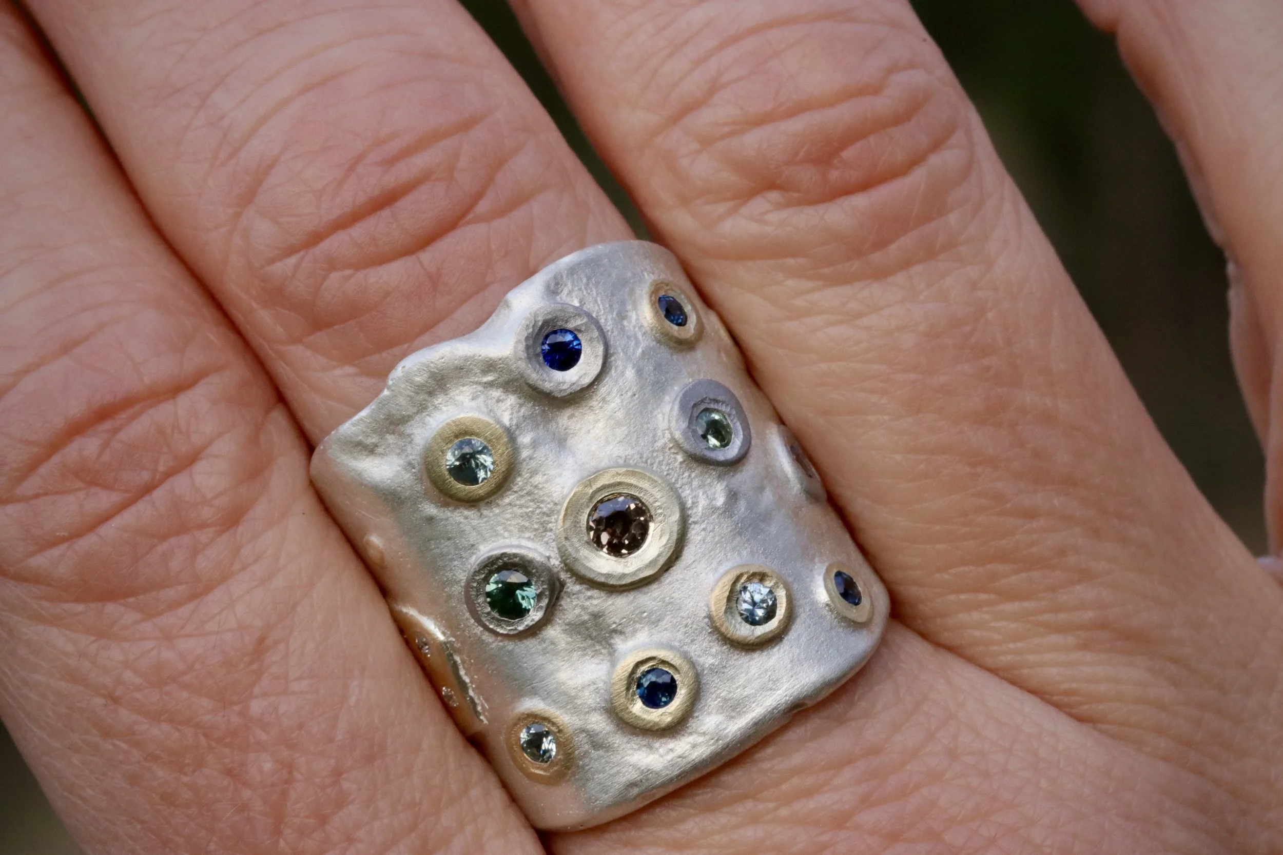 Sapphire & Diamond Saddle Ring in Platinum/ 22K Gold/Forged Sterling Silver