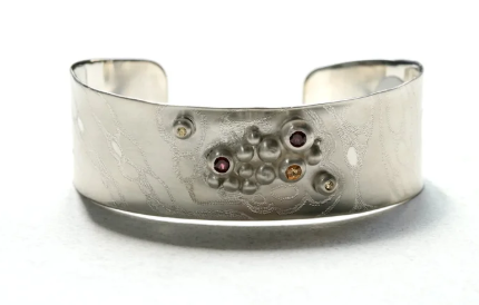 Harmony of Movements - Garnet & Sapphire Cuff Bracelet in Sterling Silver