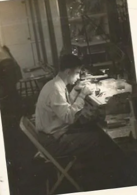 Ali Lee's grandfather, jeweler and watchmaker, at the bench — three generations of goldsmiths, Big Sur Goldsmiths legacy
