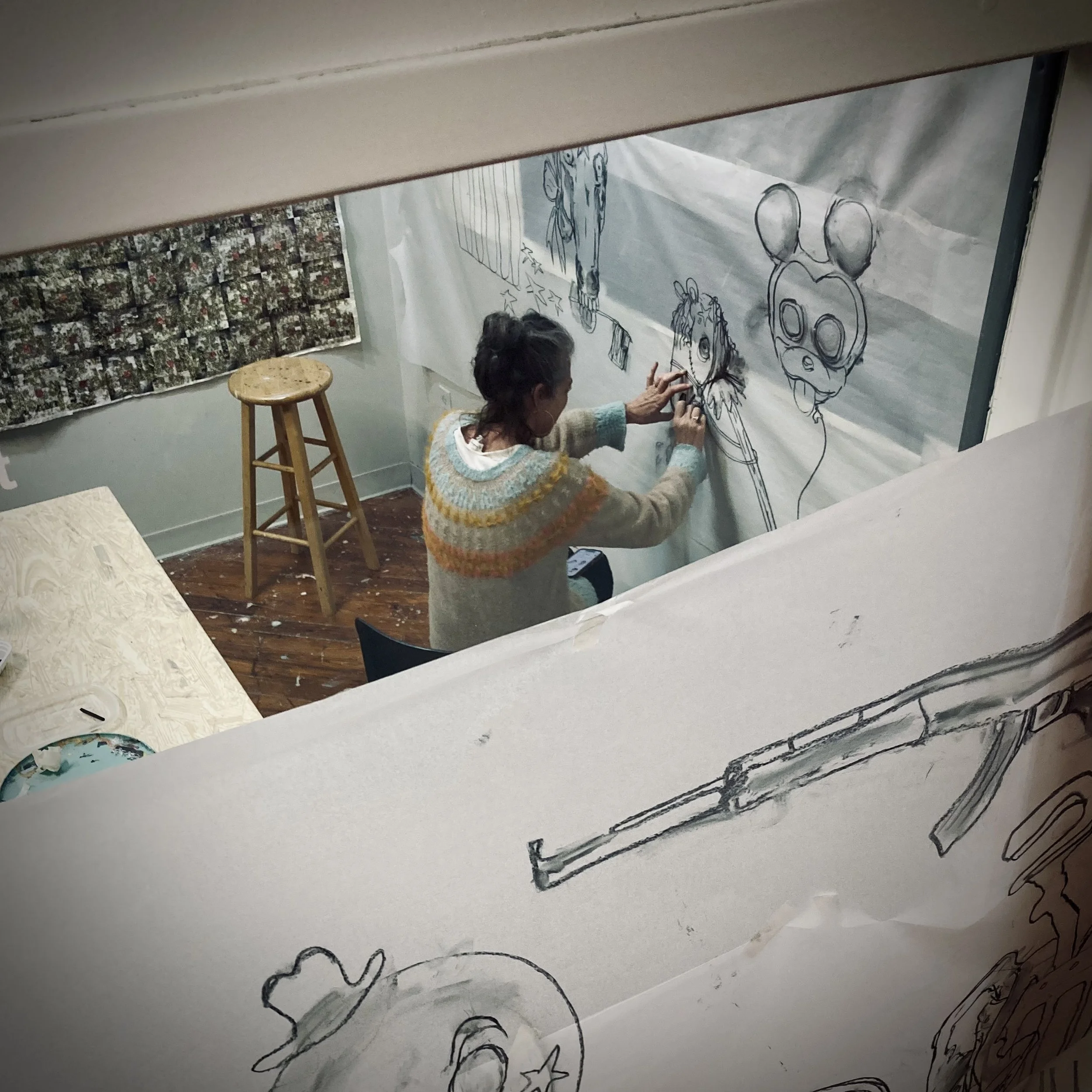 Jenny drawing in the studio