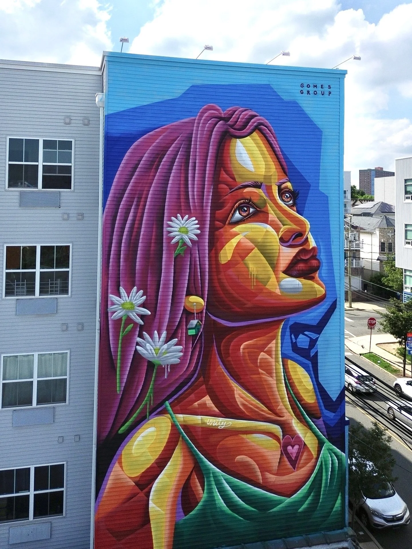 Unity 

From a blank wall to something you can feel 
&ldquo;Unity&rdquo; rises over 40 ft in Newark, portraying a female figure that represents connection. Between people, art, and the spaces we move through every day
a moment of hope, a shift in col