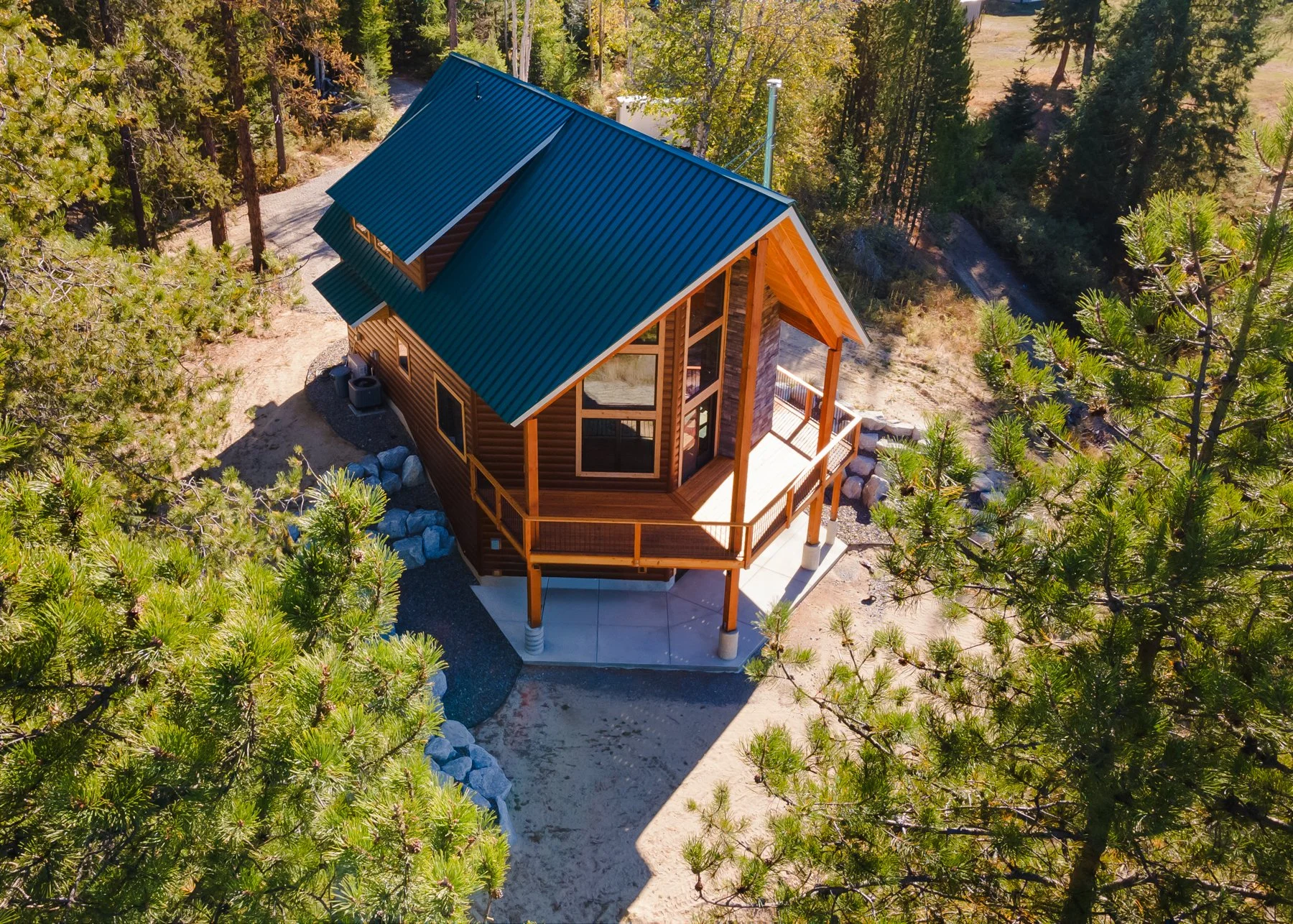 Wilkinson Construction custom home exterior in Sandpoint Idaho woods