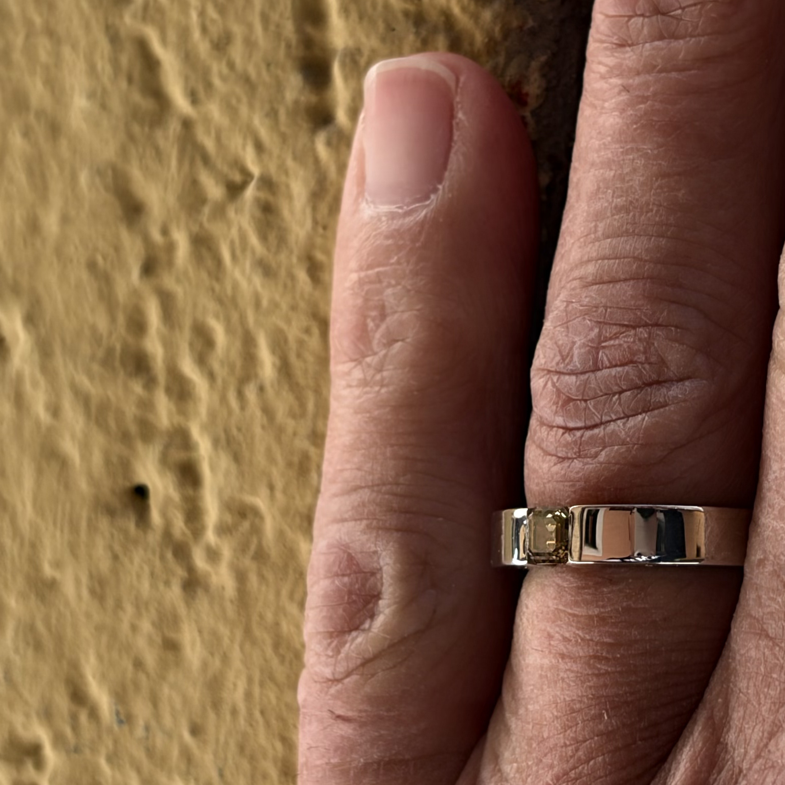 ECHØ Dune men’s engagement ring with natural Fancy Brown Yellow diamond shown worn from the front