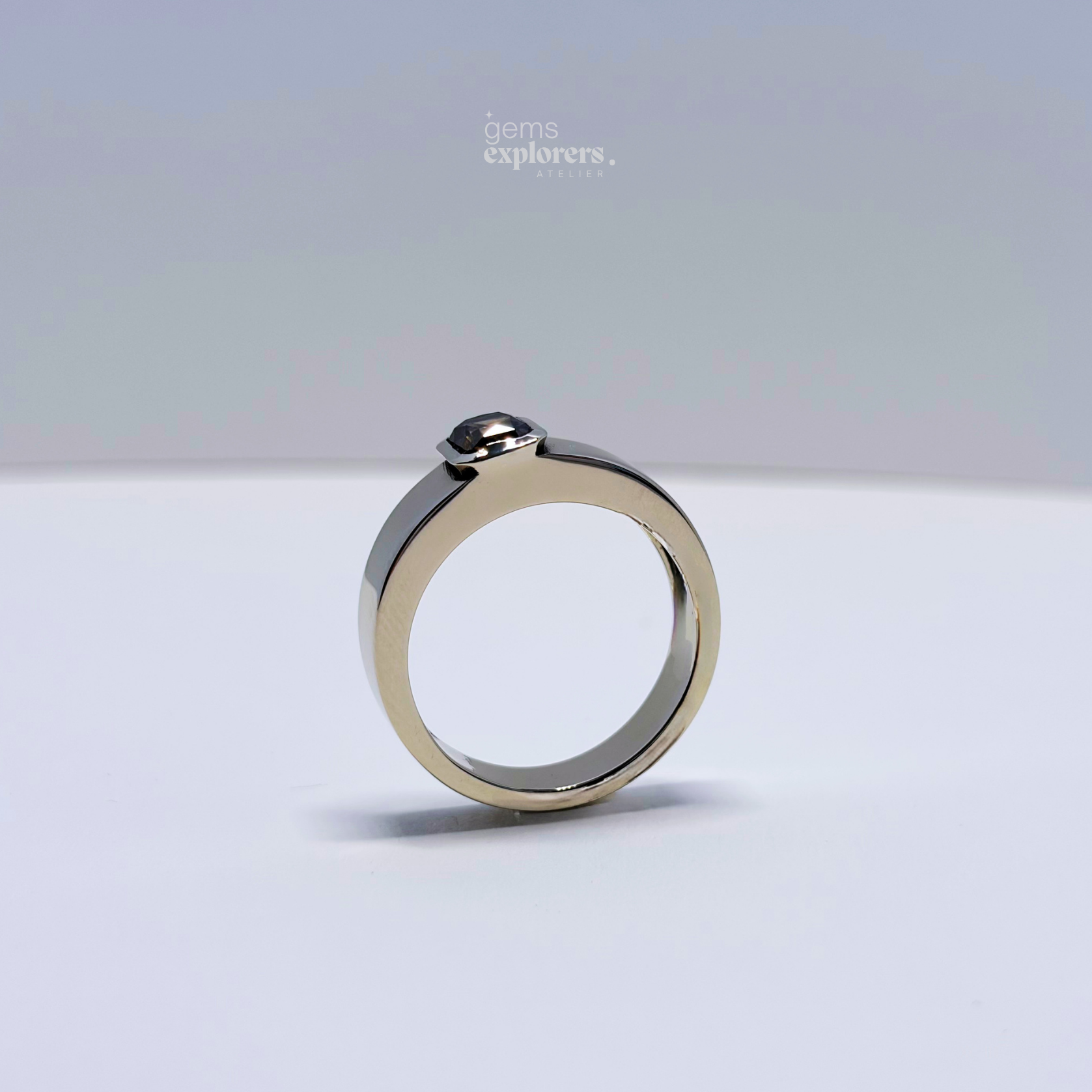 ØRIGEN ring with 0.73 ct natural Fancy Deep Brown Yellow diamond shown front-on