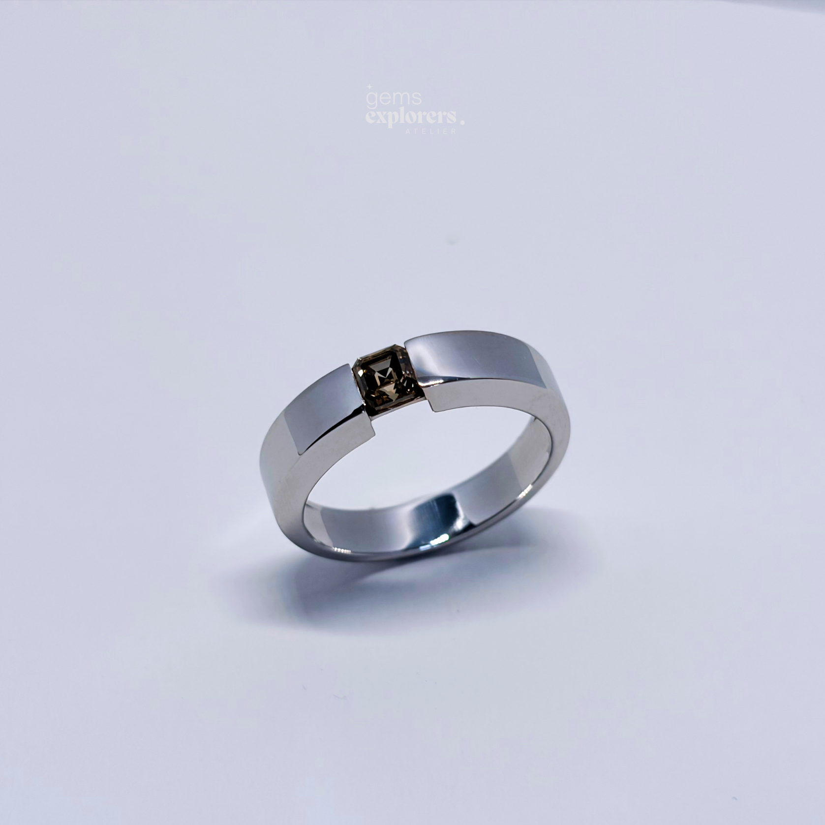 ECHØ Sienna Fancy Intense Yellowish Brown diamond ring shown in three-quarter view