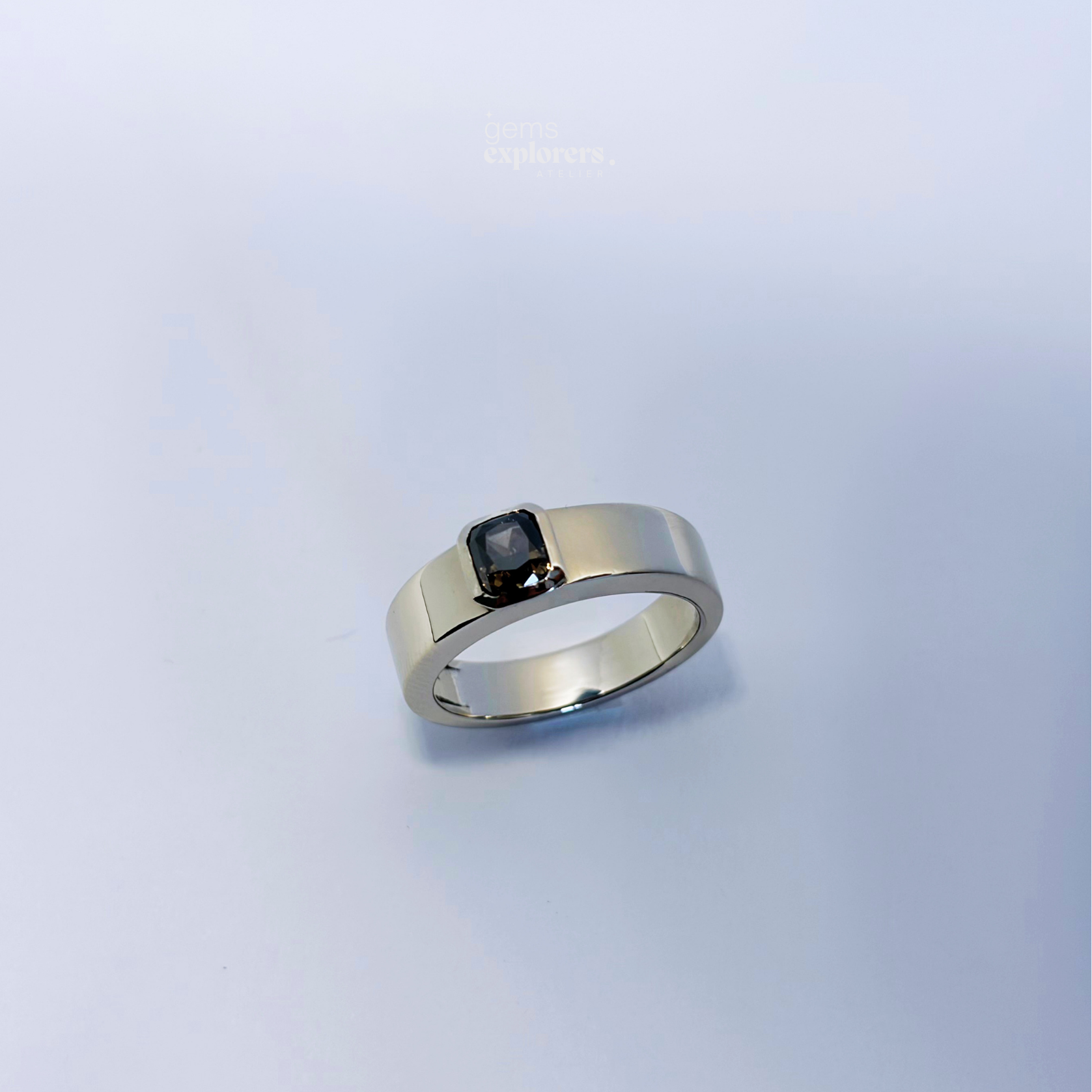 ØRIGEN Fancy Deep Brown Yellow diamond pinky ring shown in three-quarter view