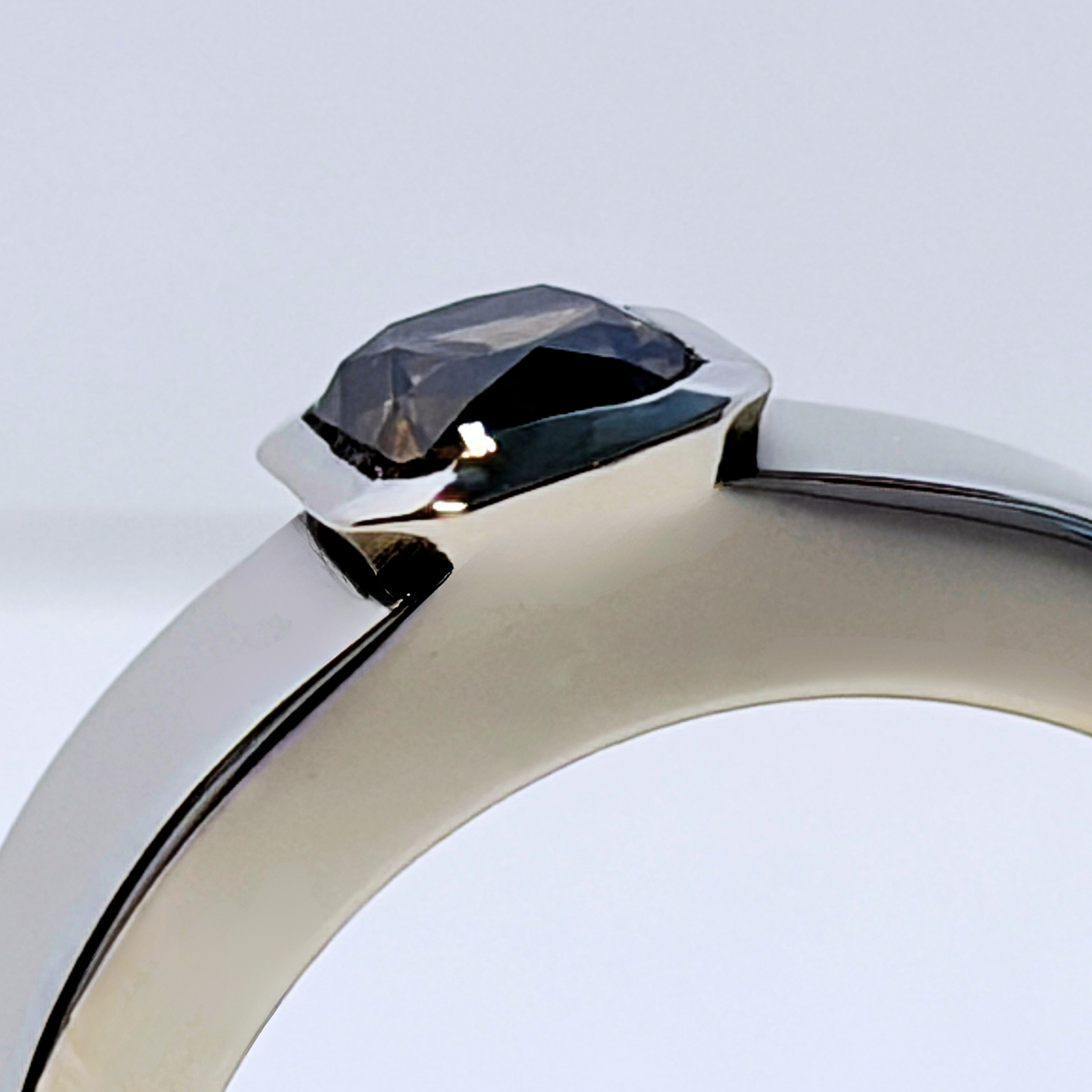 Close-up of ØRIGEN ring with 0.73 ct natural Fancy Deep Brown Yellow diamond