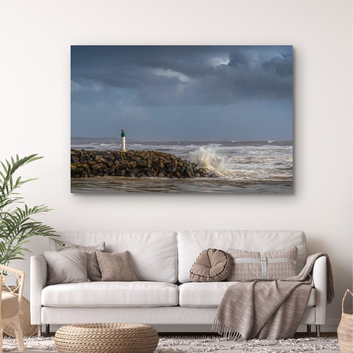 Harbour entrance and rough seas beneath storm clouds.