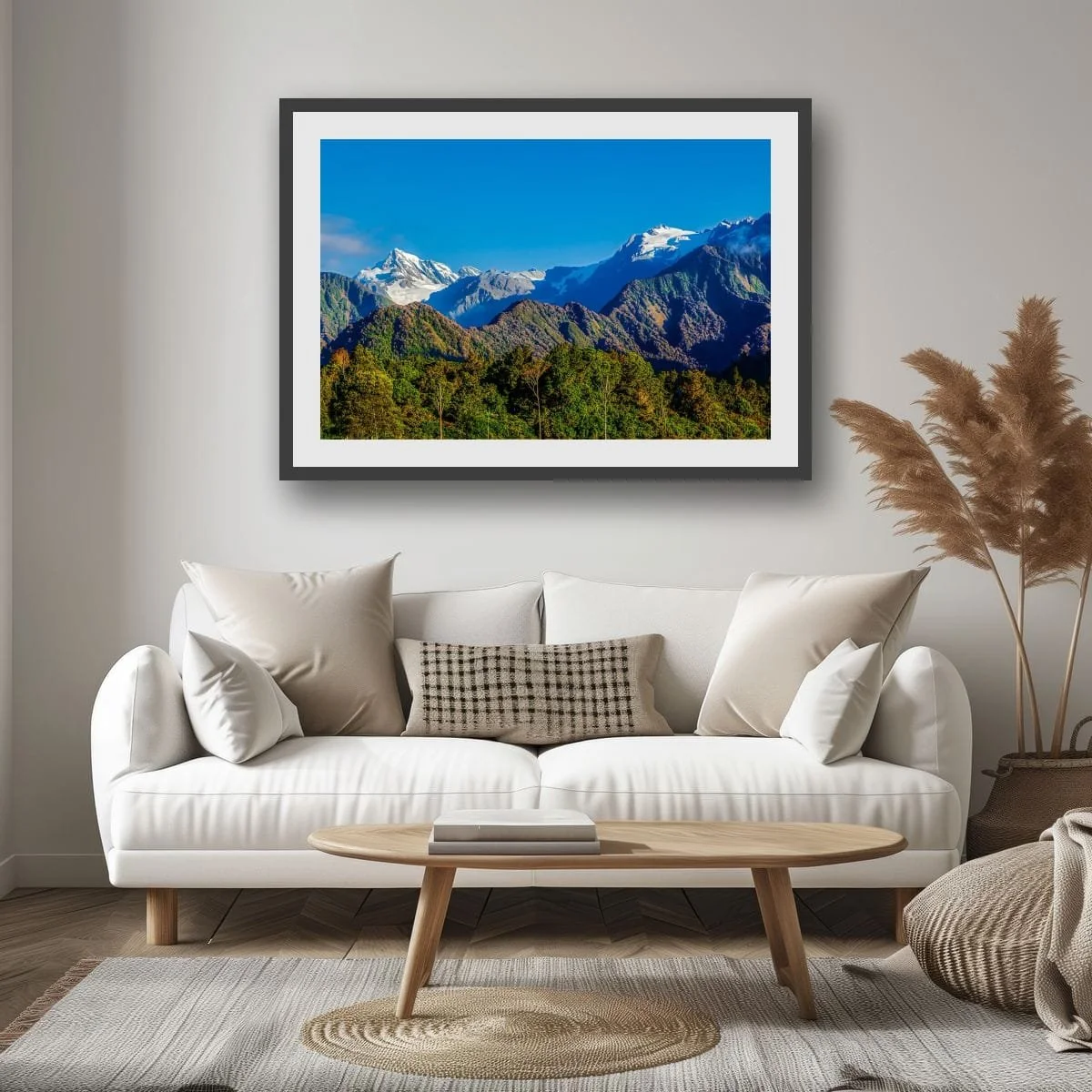 Aoraki Mount Cook rising above forested foothills and alpine peaks.