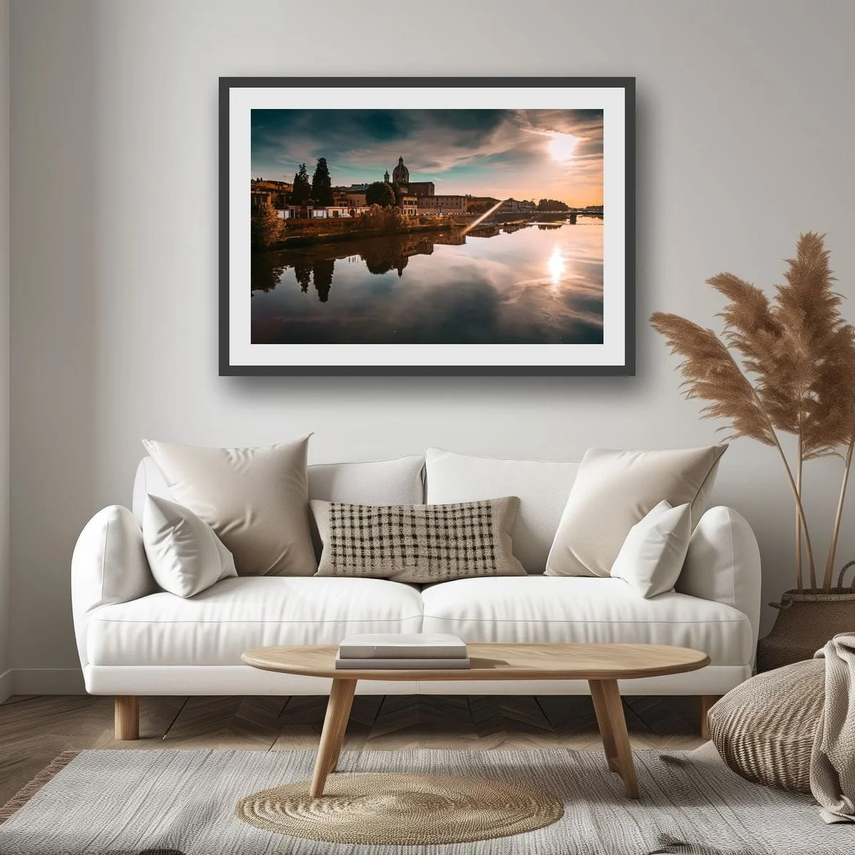 Florence skyline reflected in the Arno River during golden hour.