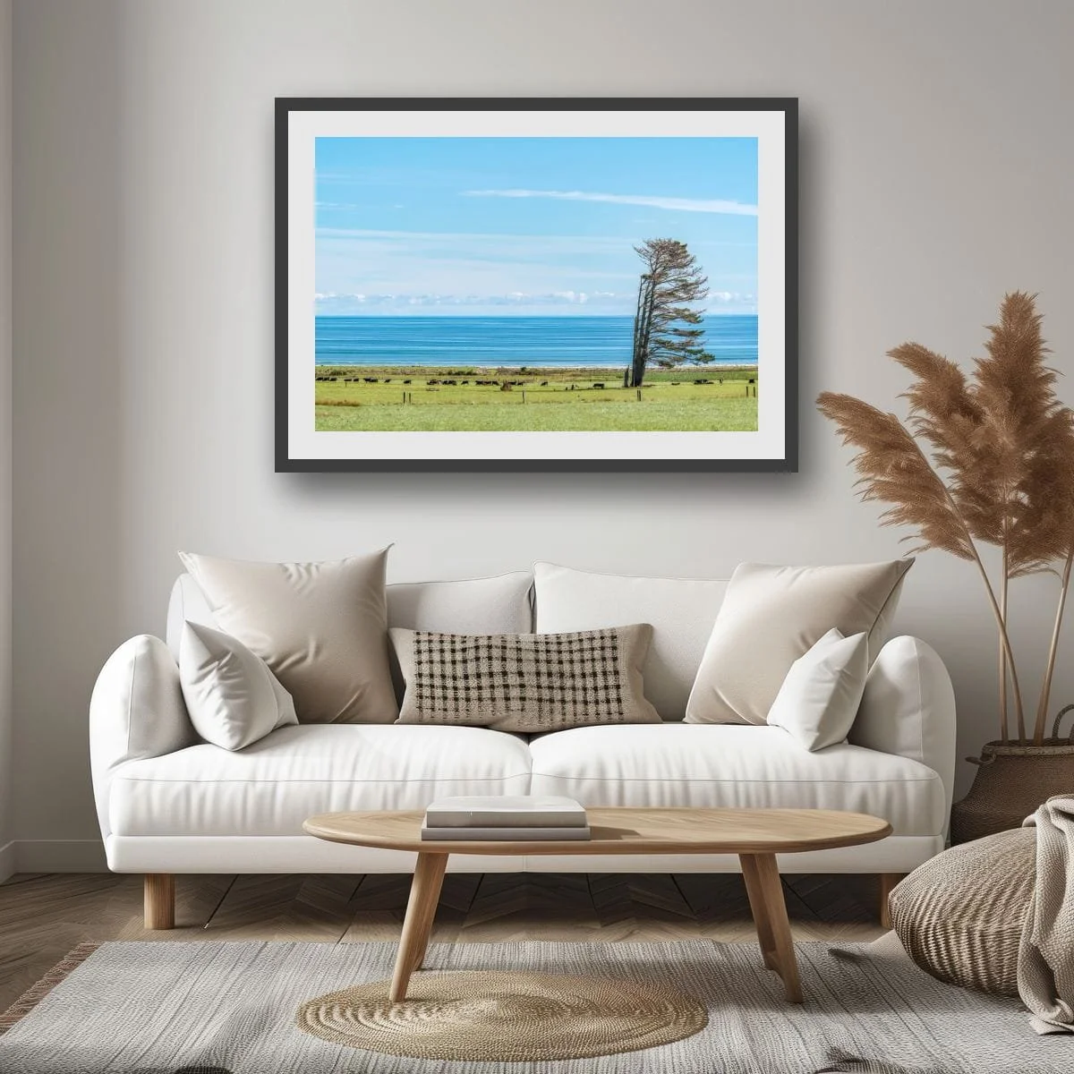 Wind-shaped coastal trees overlooking farmland and ocean views.