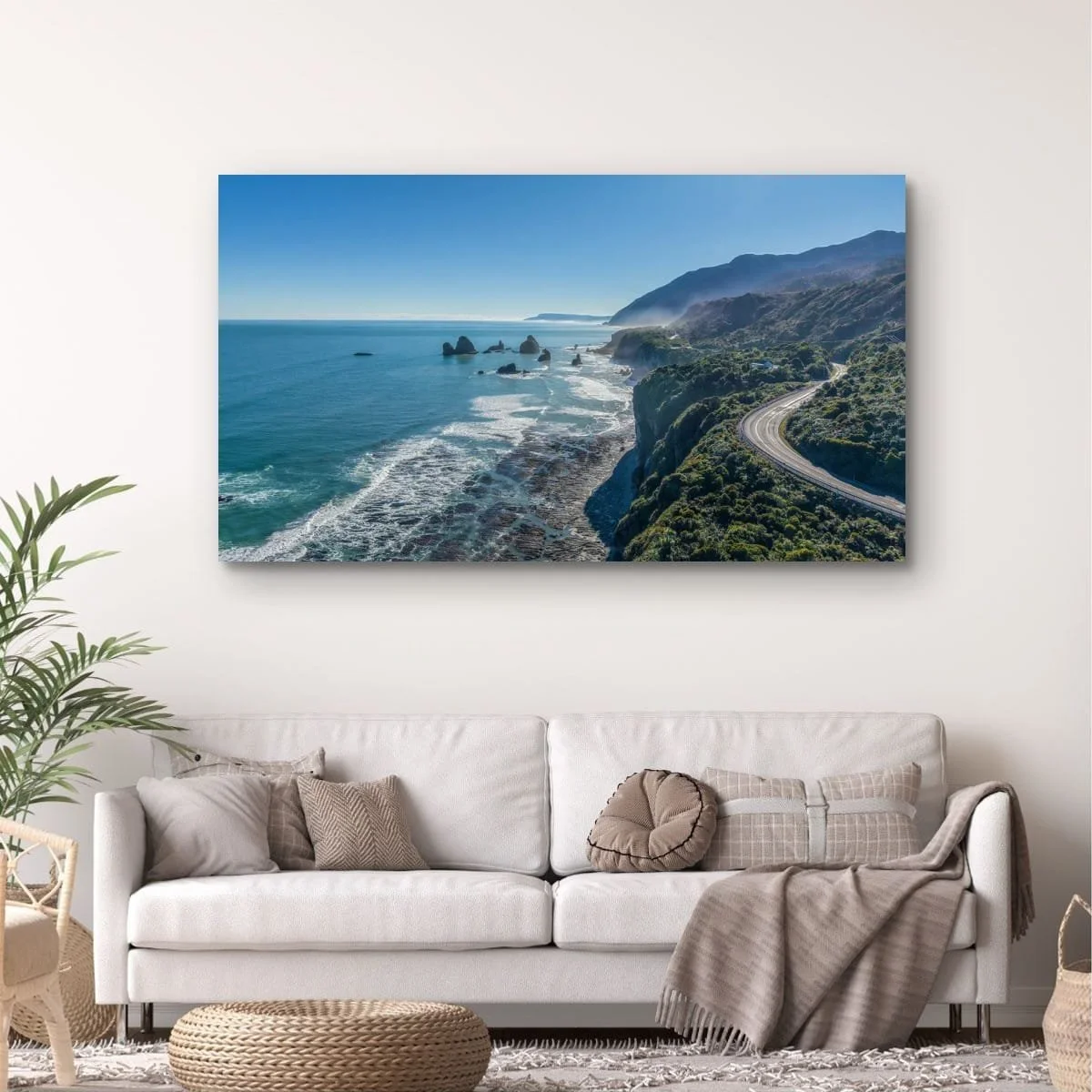 West Coast aerial view where mountains meet the Tasman Sea.