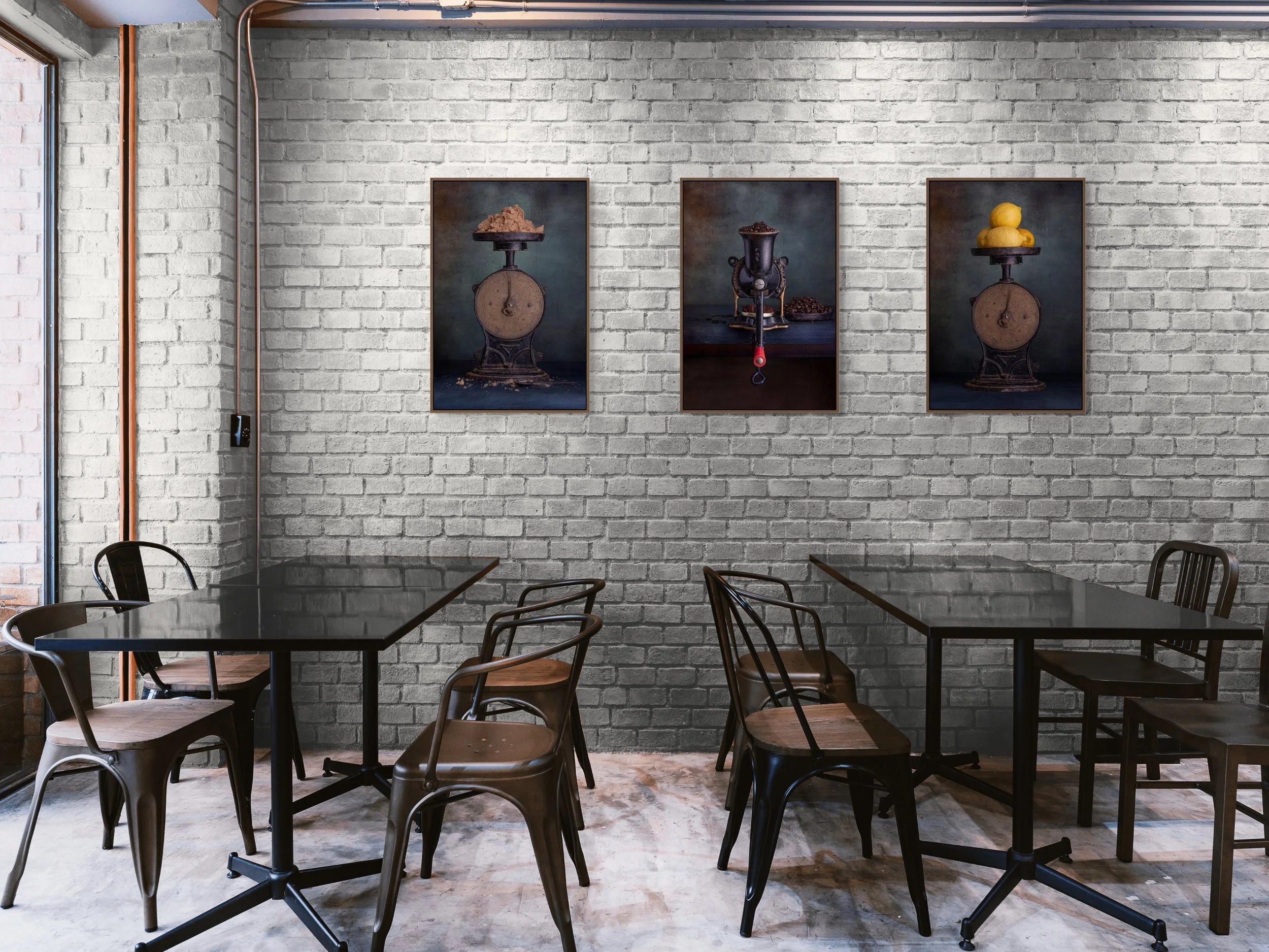 Yellow lemons stacked on a vintage kitchen scale against a textured background.