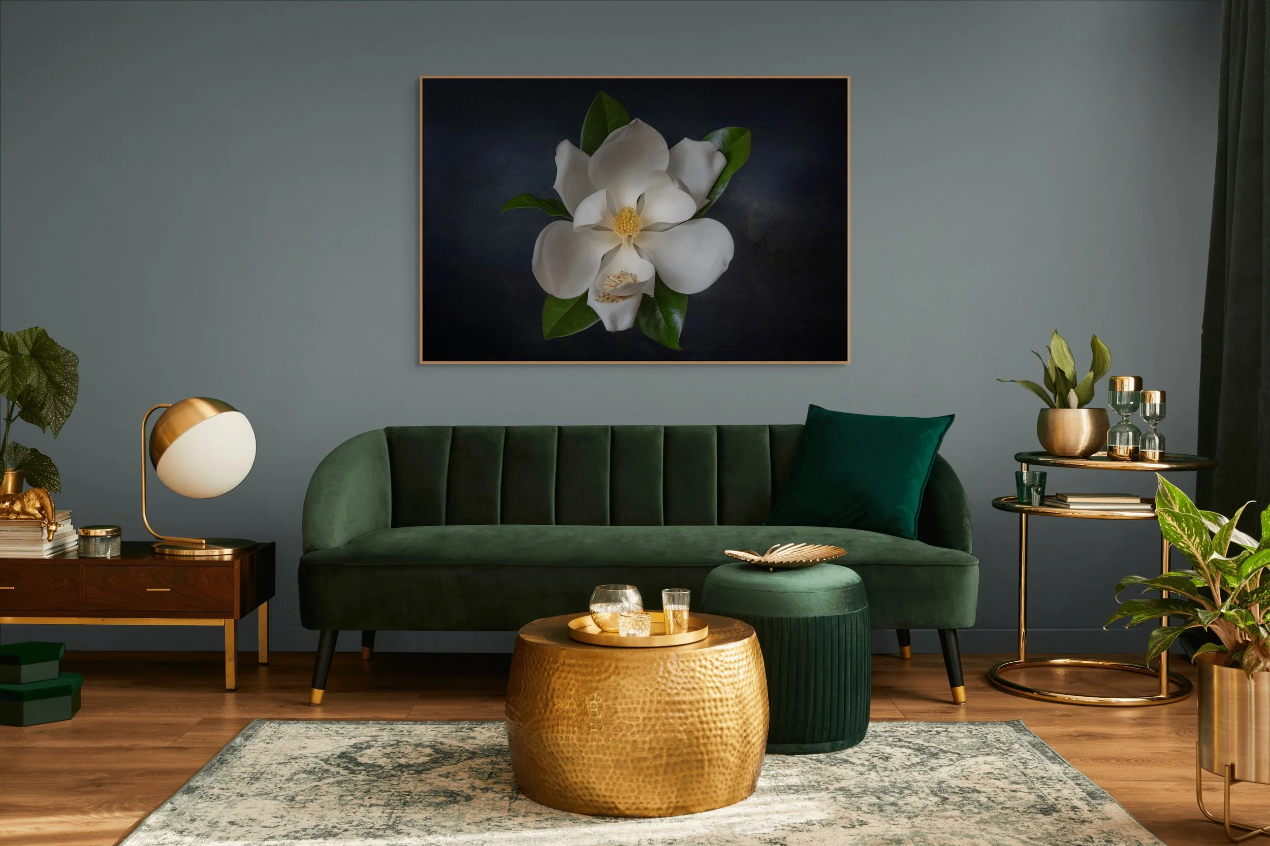 White magnolia flower against a dark painterly background.