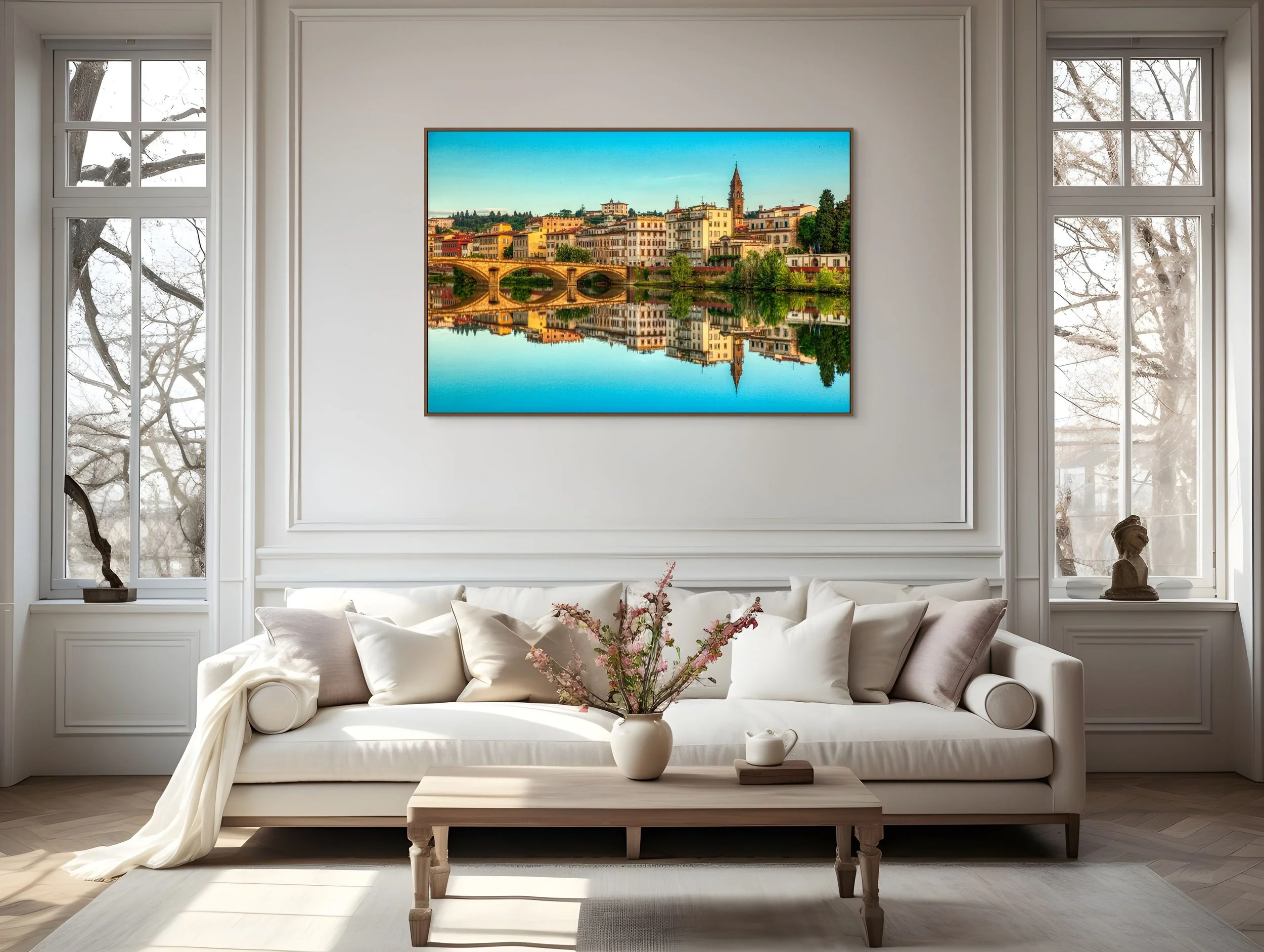 Florence city skyline reflecting in the Arno River with historic bridge and buildings in Italy.