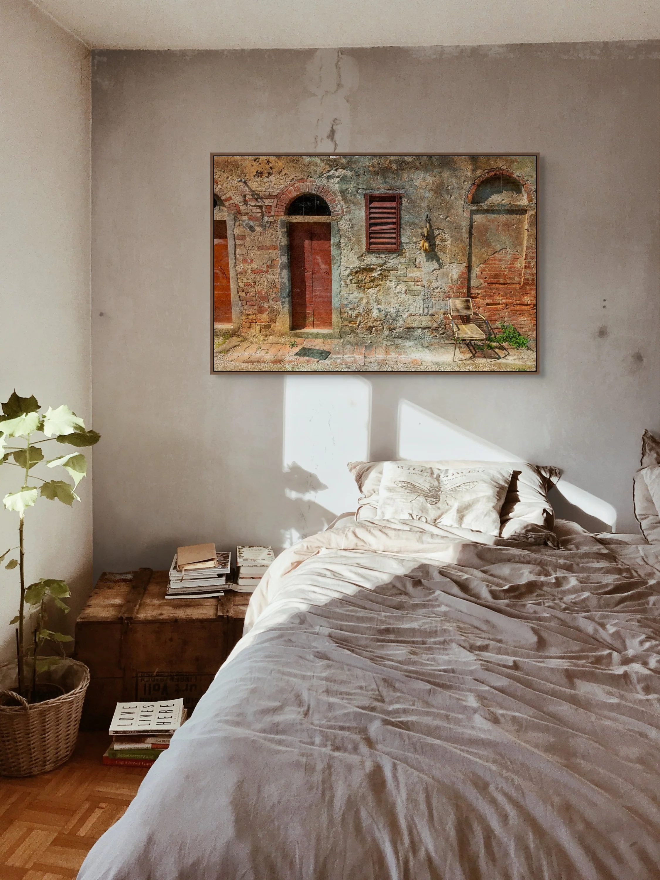 Italian travel fine art photograph of a lone chair rests quietly against an aged brick wall, where sun-faded shutters, worn plaster and weathered doors speak, by From The Field.
