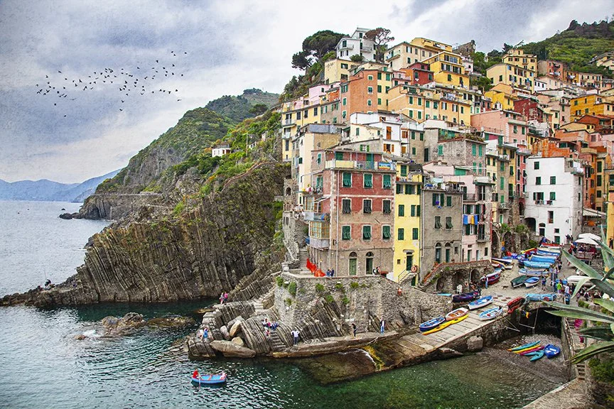 Colourful cliffside village overlooking the sea in Cinque Terre Italy.