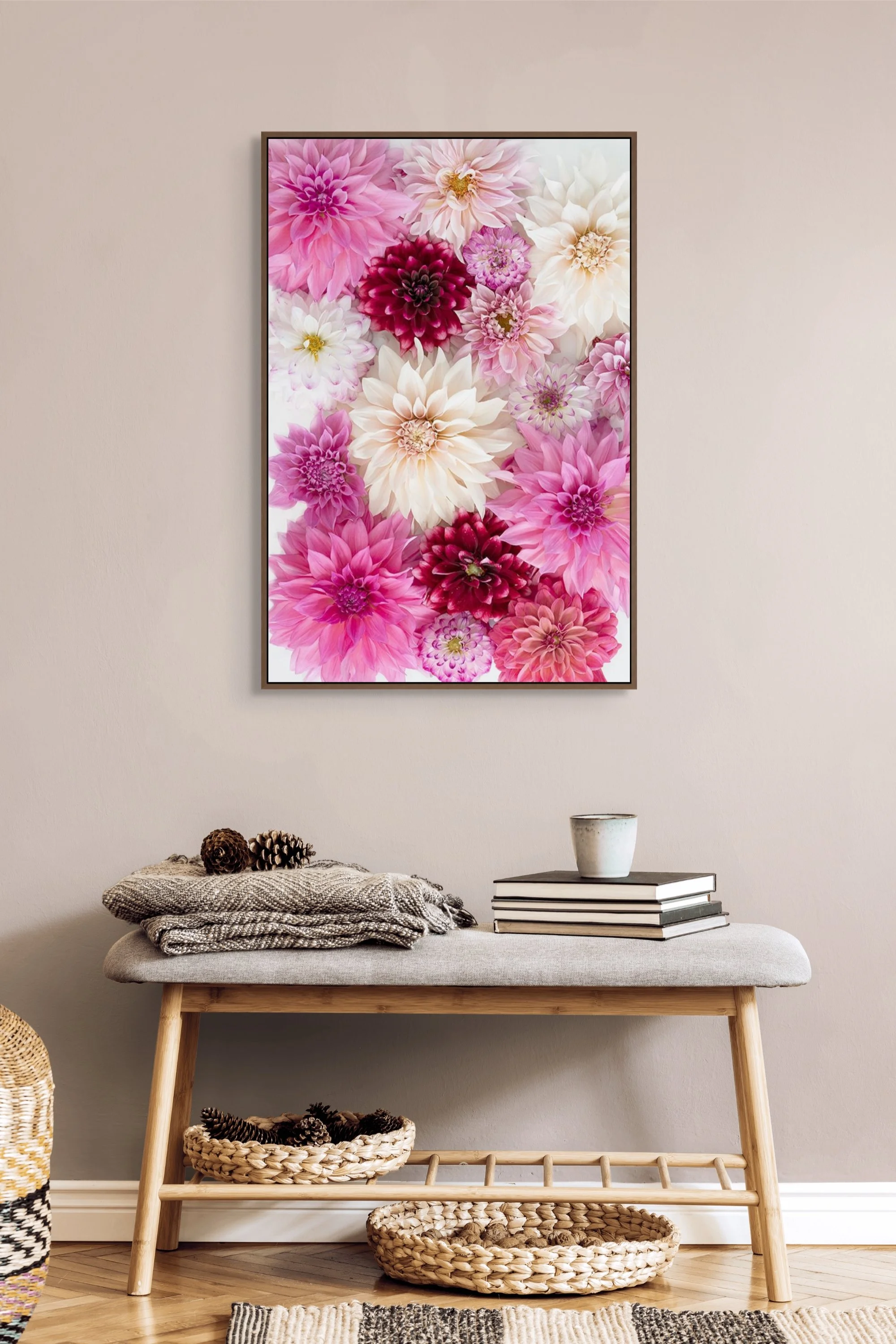 Soft pink and cream dahlia flowers arranged on a light background.