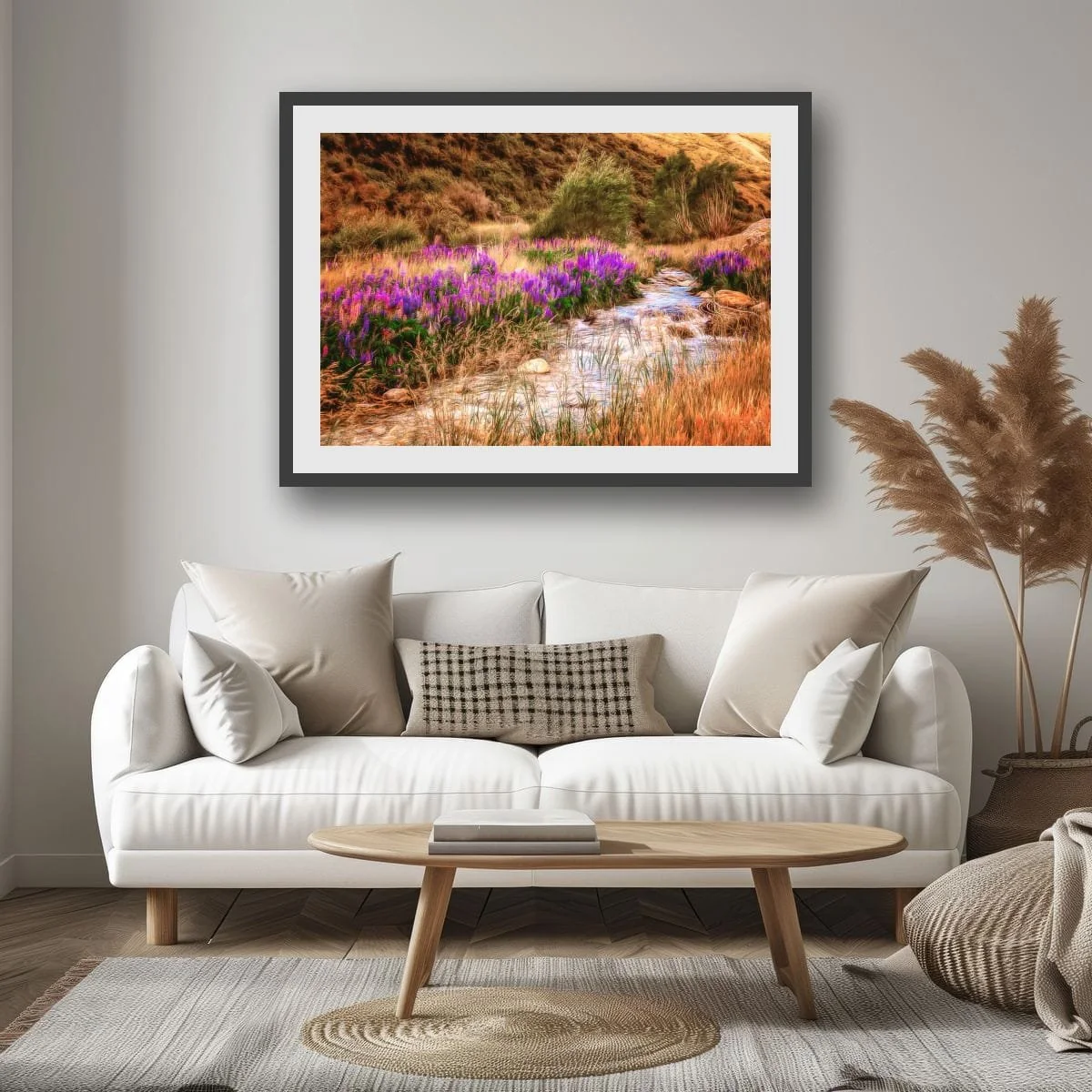 Purple lupins growing beside a winding stream in New Zealand high country.