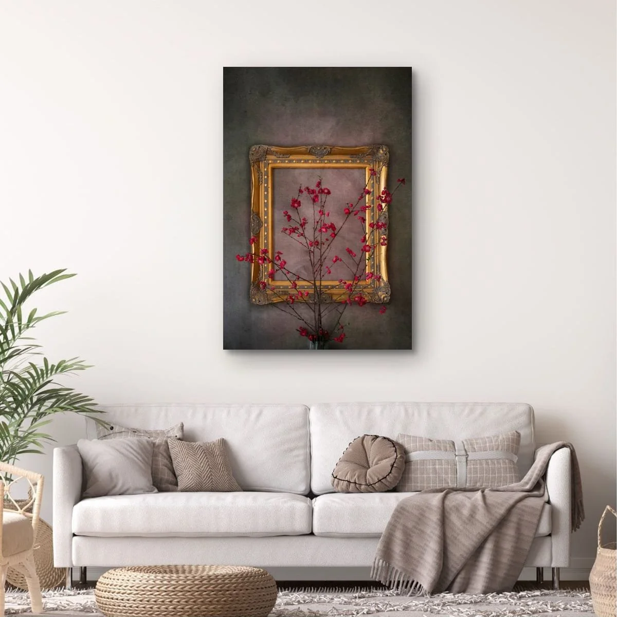 Crimson blossom branches framed by an ornate vintage frame.